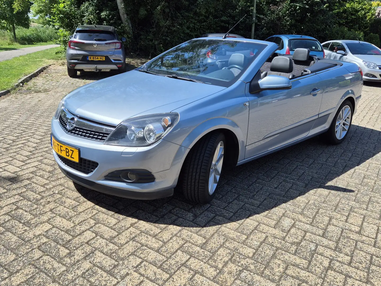 Opel Astra 1.8 Cosmo Blauw - 1