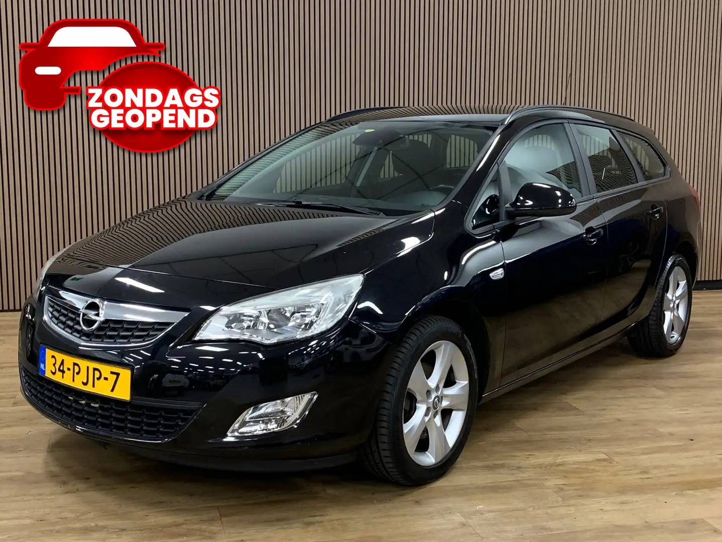 Opel Astra Sports Tourer 1.4 Turbo Edition|Climate Control|15 Zwart - 1