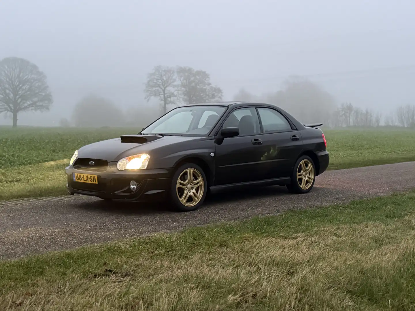 Subaru Impreza 2.0 WRX AWD | Origineel NL | Java Black Pearl Zwart - 1