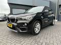 BMW X1 S-Drive 1.8i High Executive Aut. Navigatie Zwart - thumbnail 1