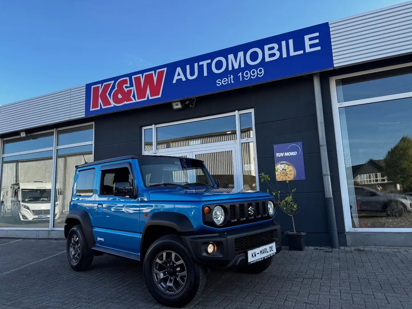 Suzuki Jimny Comfort+ AllGrip NAVI KLIMAAUTO AHK SITZH. Azul - 1