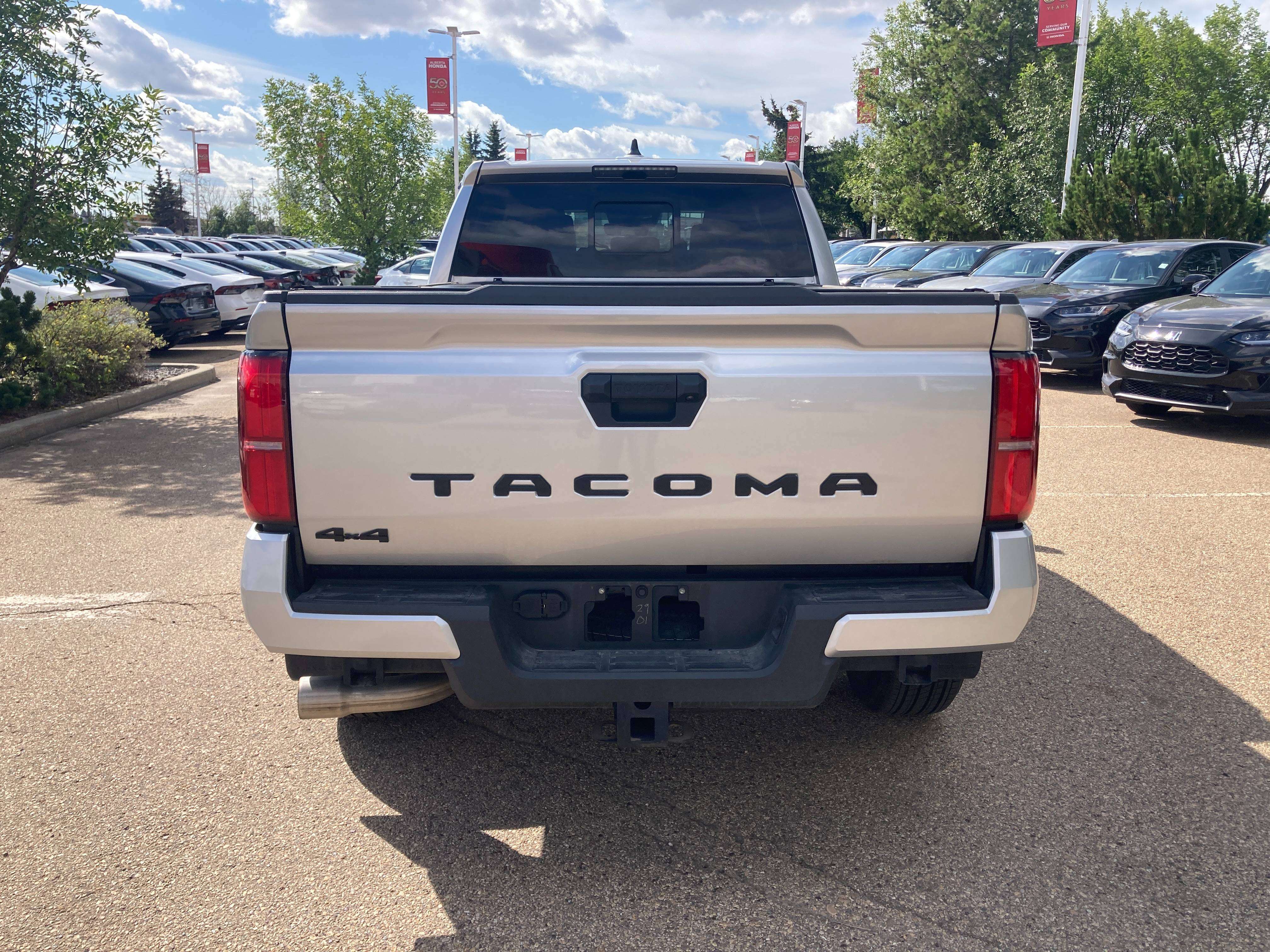 used 2024 Toyota Tacoma car, priced at $50,900