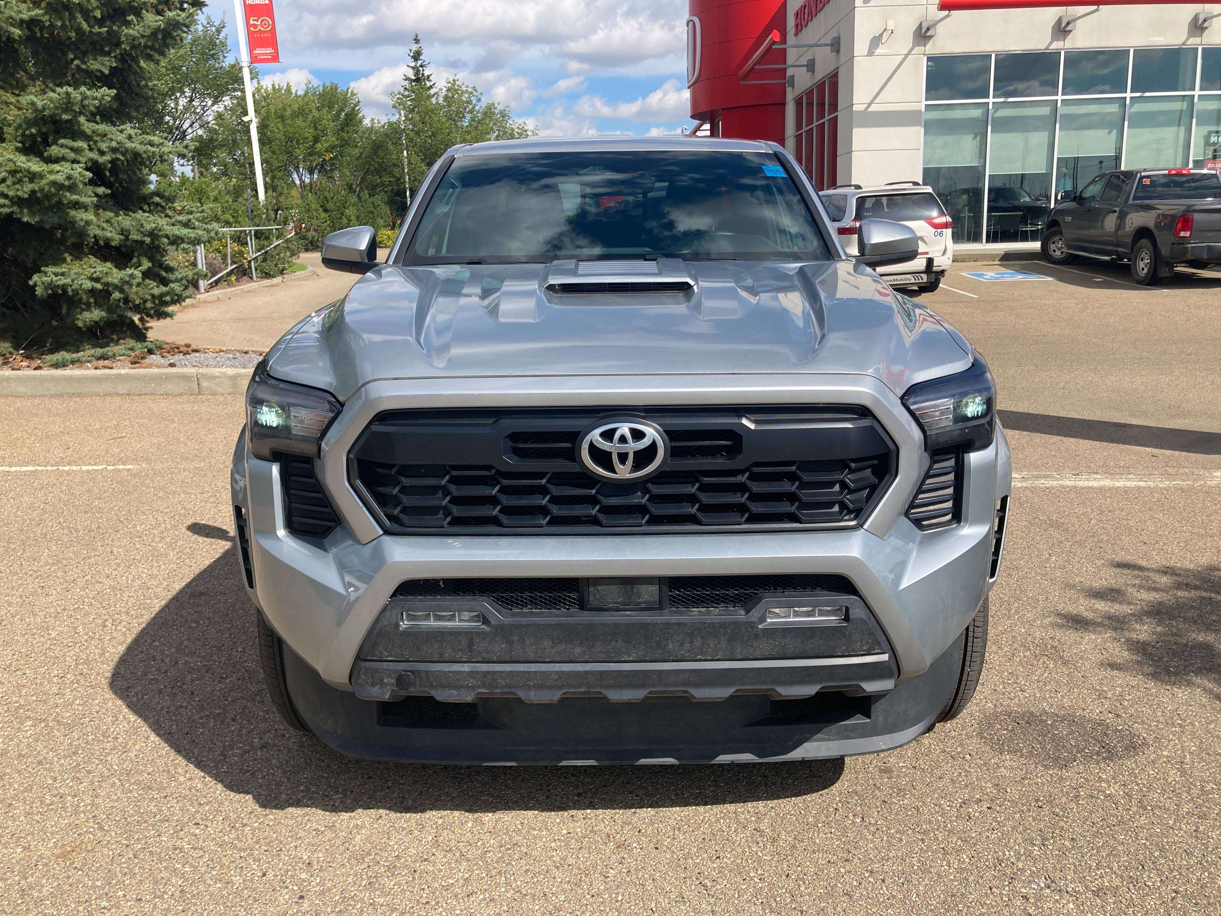 used 2024 Toyota Tacoma car, priced at $50,900
