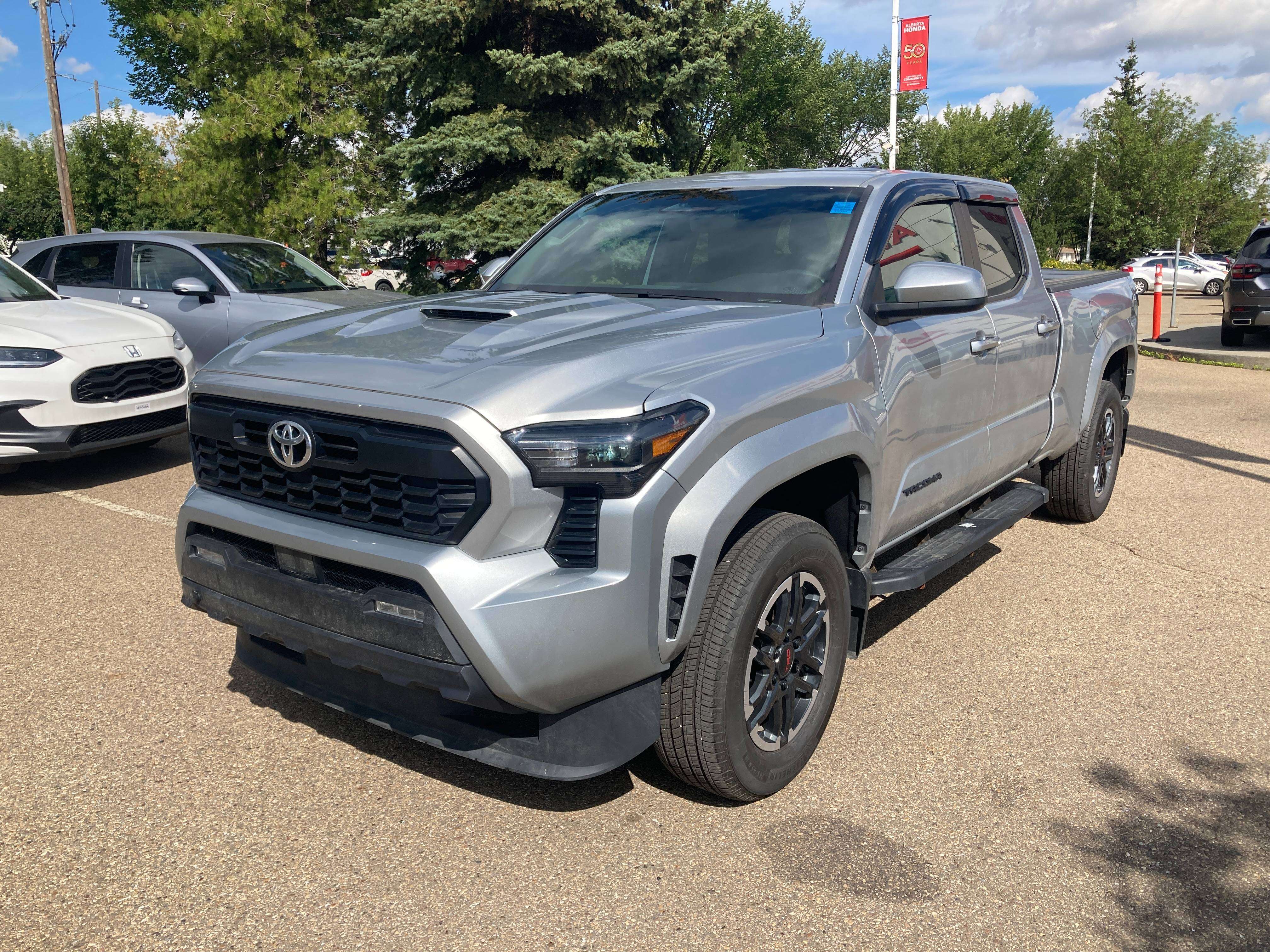 used 2024 Toyota Tacoma car, priced at $50,900