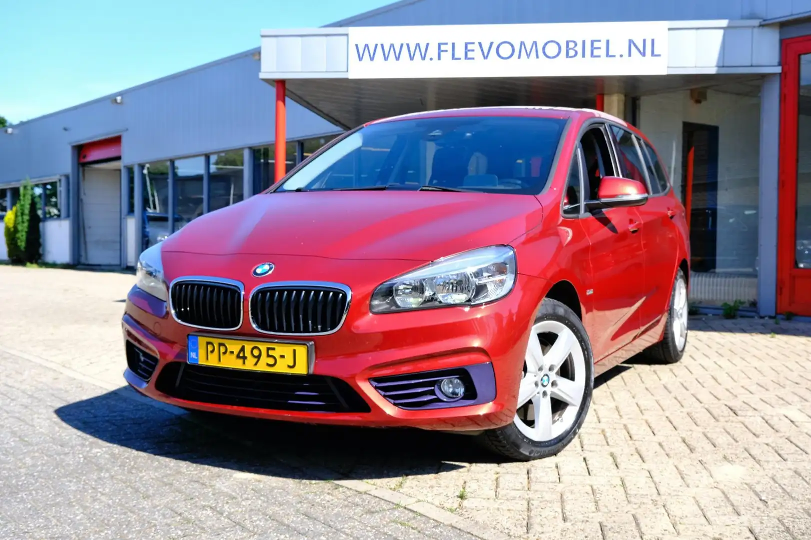 BMW 220 2-serie Gran Tourer 220i Sport Aut. Pano|Sportstoe Rood - 1