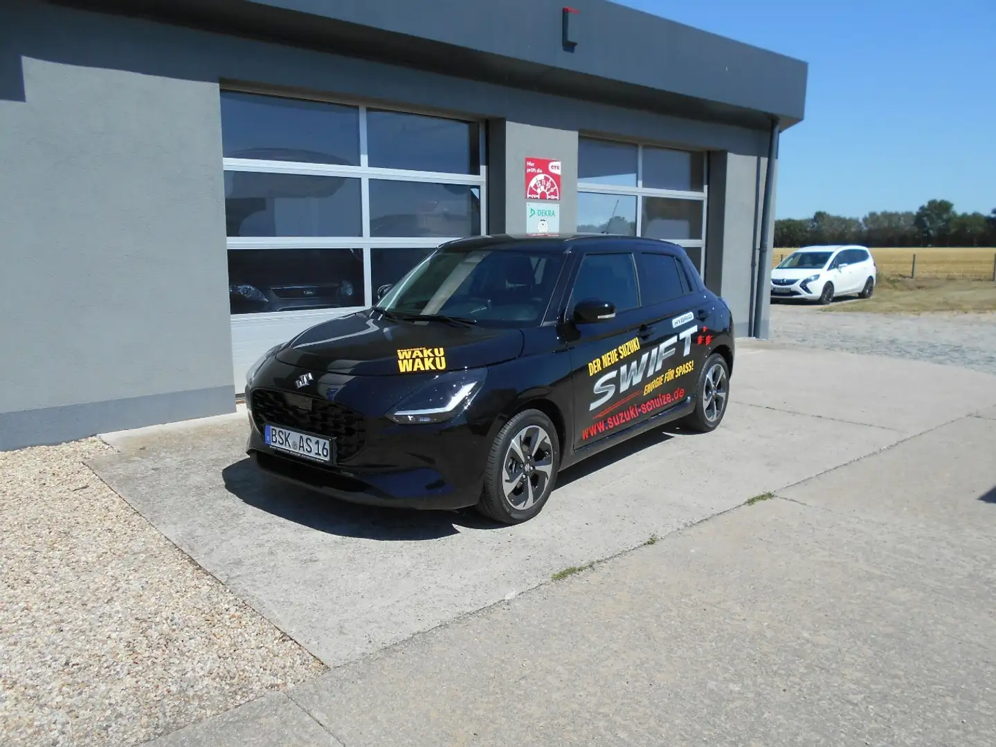 Suzuki Swift 1.2 Dualjet Comfort+ Noir - 1