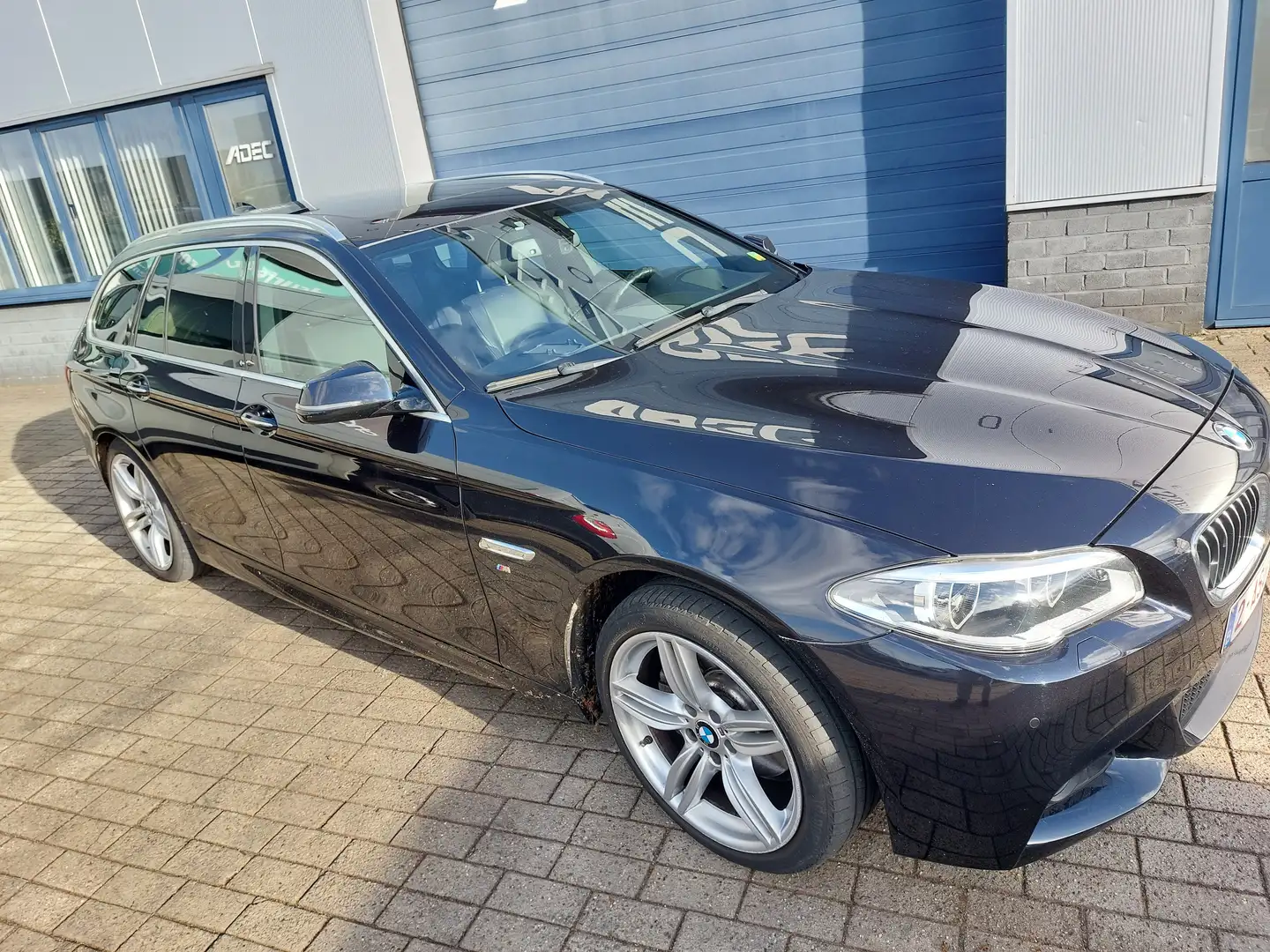 BMW 520 520d xDrive Touring Aut. Luxury Line Blauw - 1