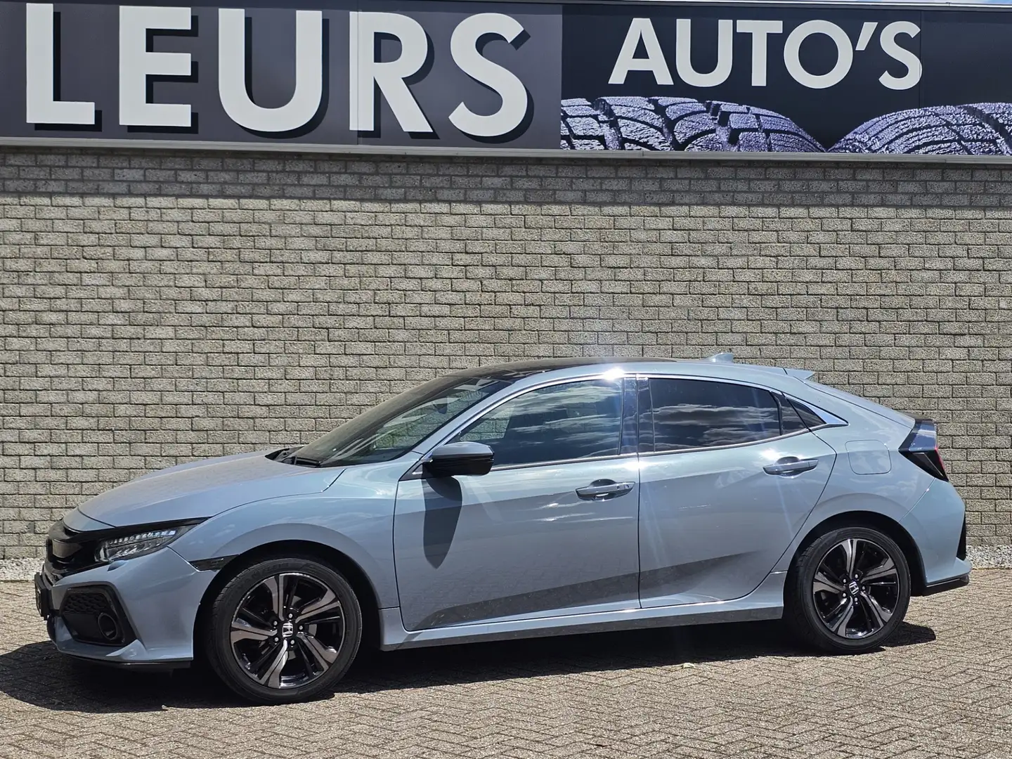 Honda Civic 1.0 i-VTEC Premium Leer/Pano-dak Grijs - 1