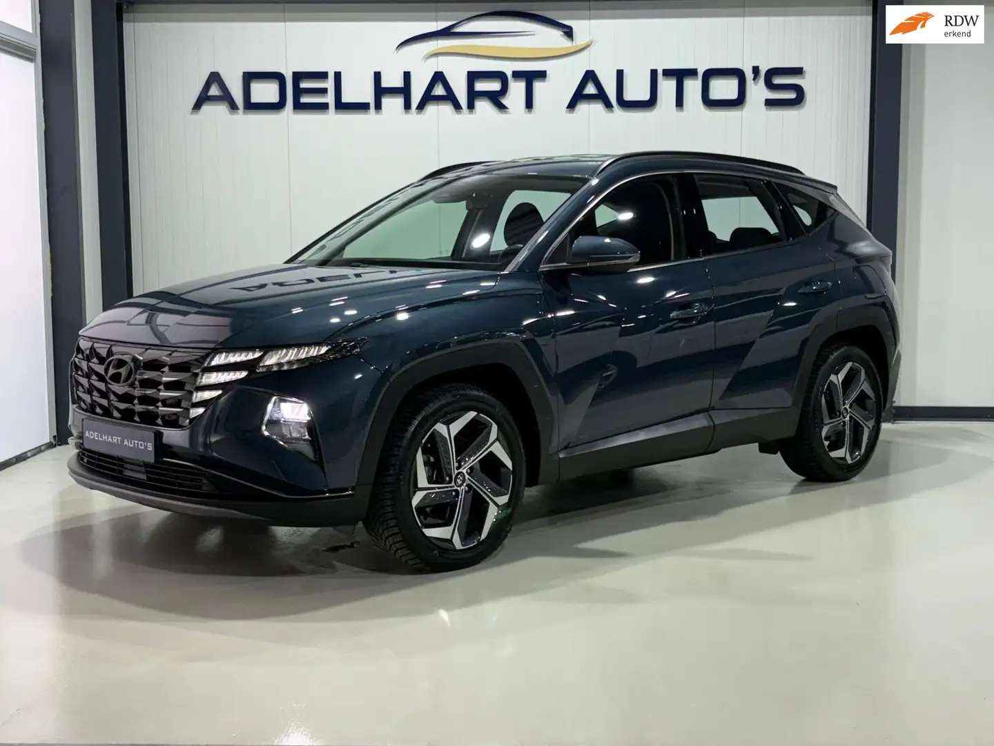 Hyundai TUCSON 1.6 T-GDI PHEV Comfort 4WD Automaat / Navigatie fu Bleu - 1