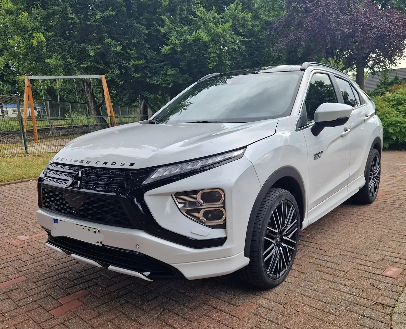 Mitsubishi Eclipse Cross Eclipse Cross Plug-In Hybrid 4WD Top Tuning 20" Weiß - 1
