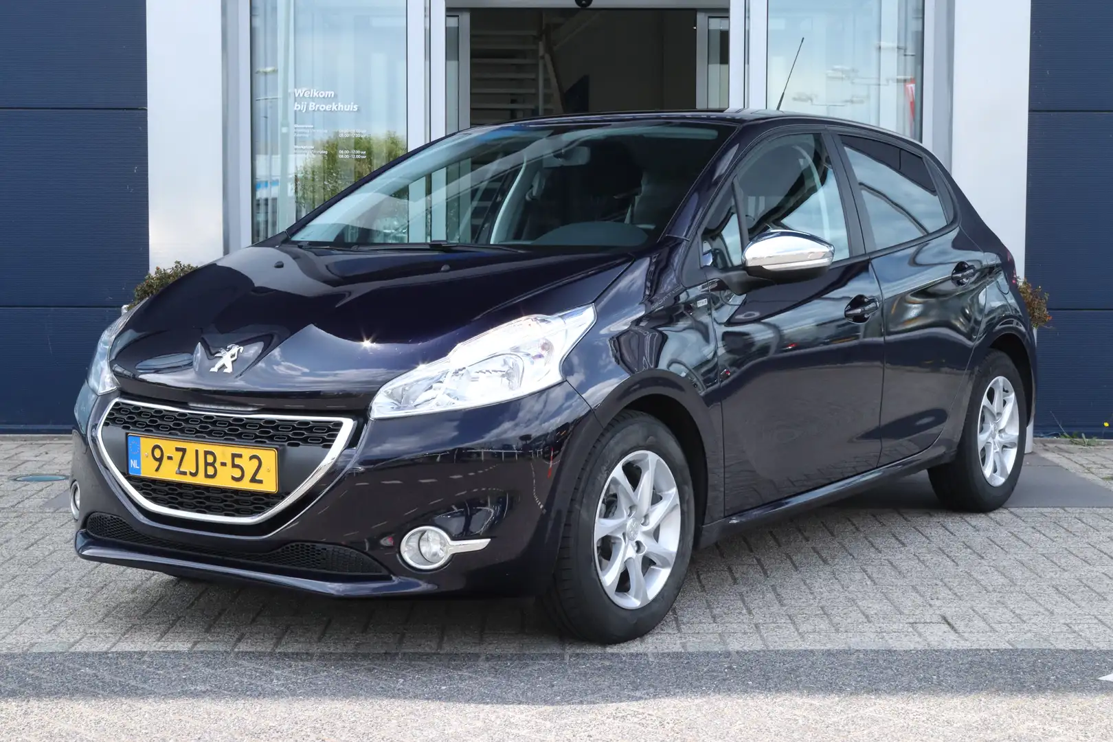 Peugeot 208 1.2 PureTech Style | Cruise Control | Navigatie | Blauw - 1