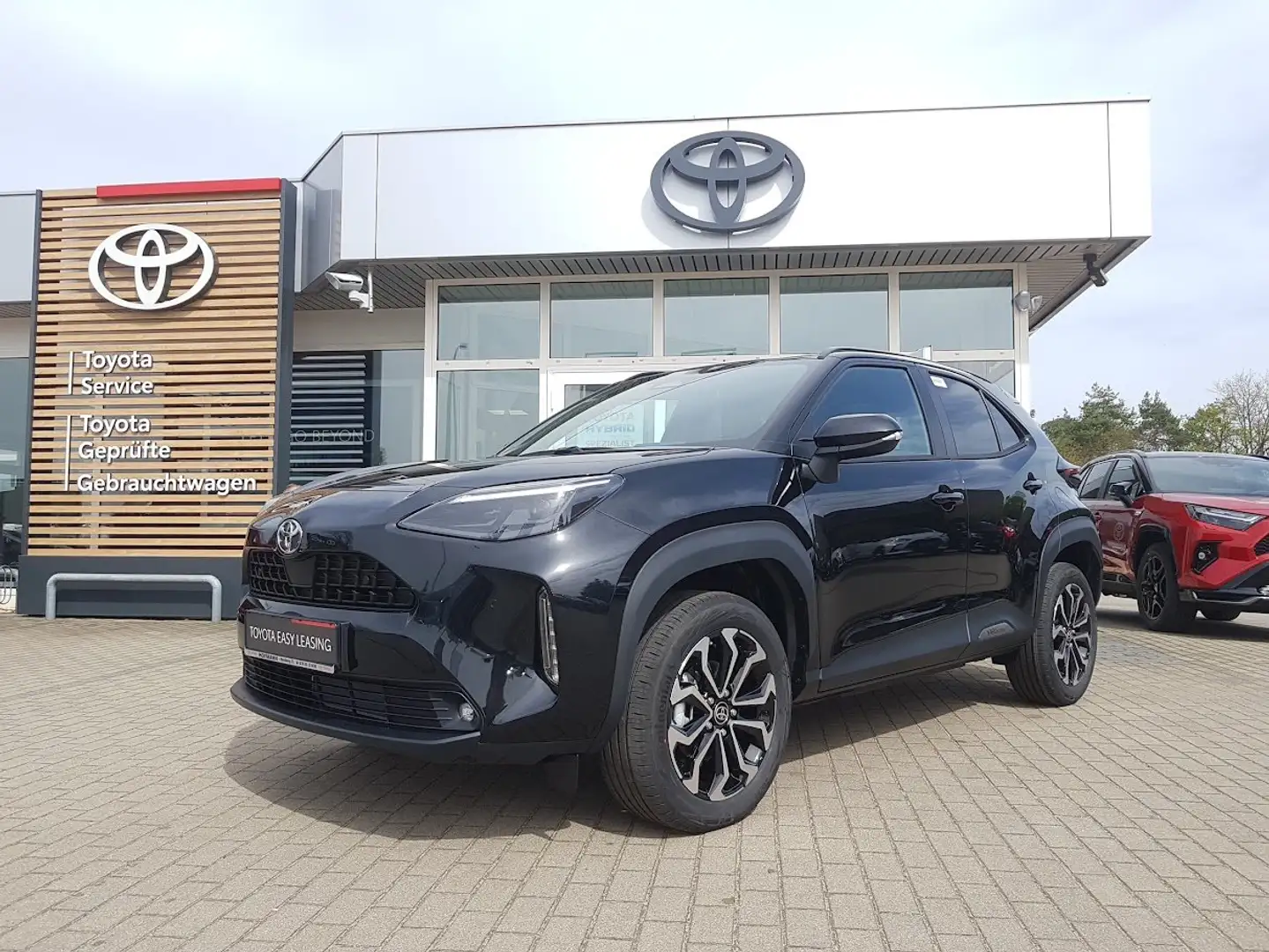 Toyota Yaris Cross 1,5-Hybrid 130 PS Teamplayer + Safety+Winter-Paket Schwarz - 1