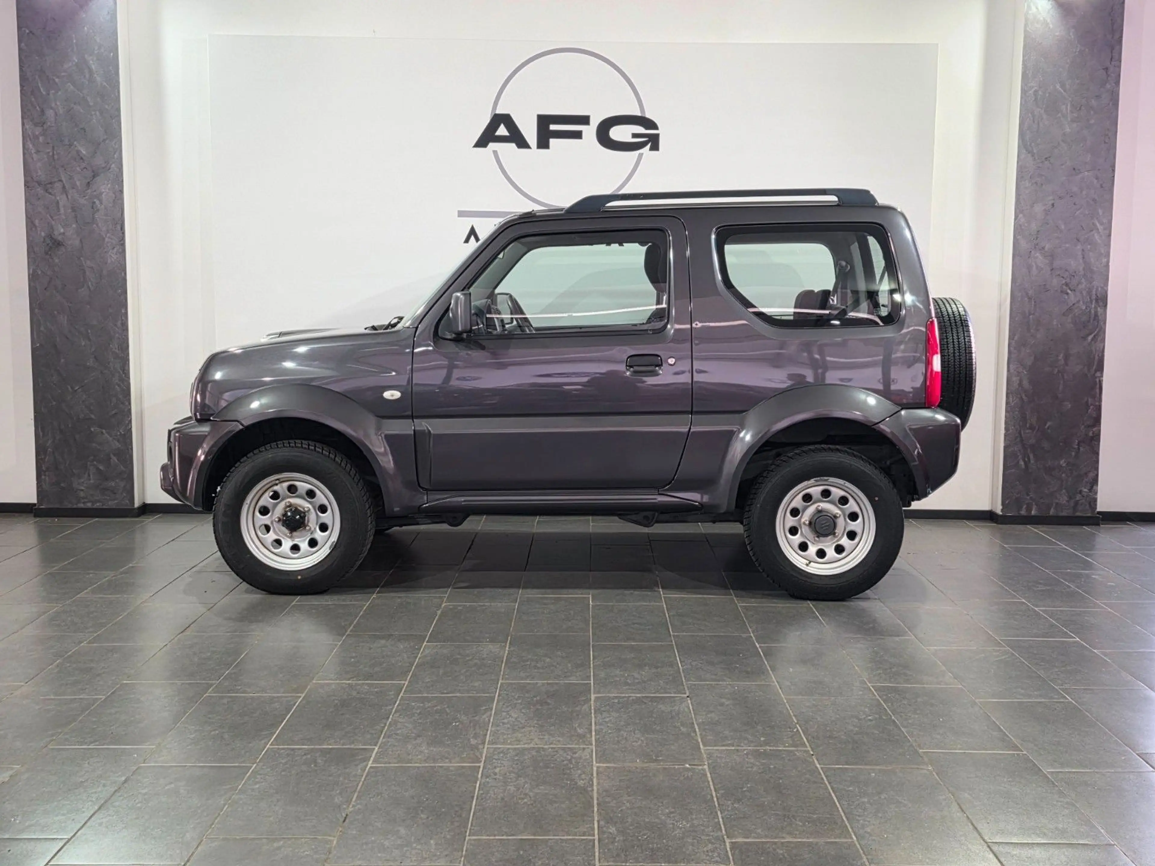 Suzuki Jimny Comfort Lim.*4X4*AHK*SHZ* — photo 8