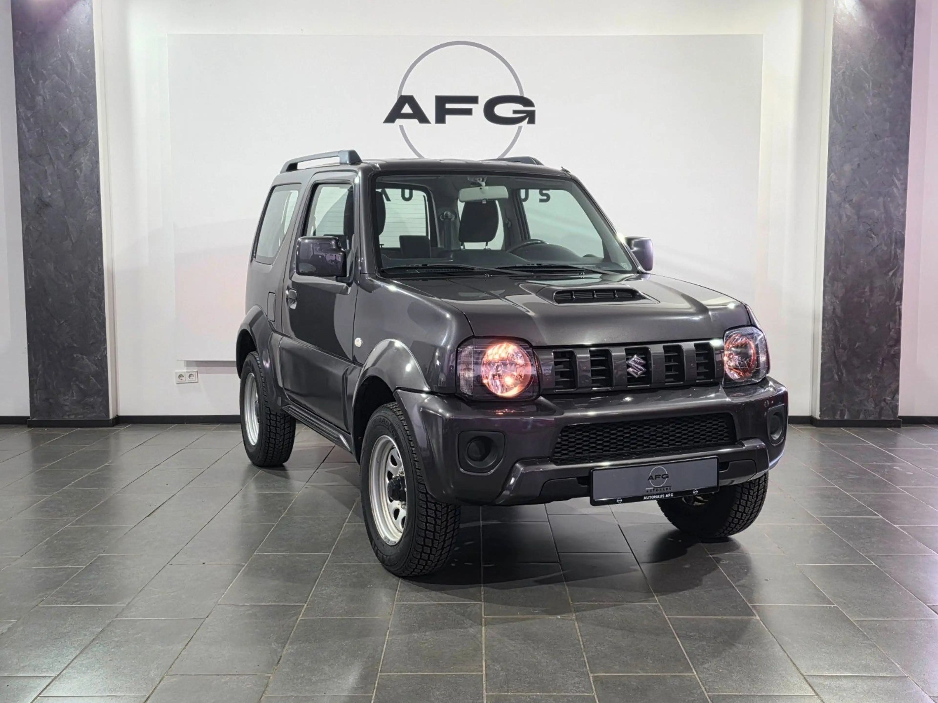 Suzuki Jimny Comfort Lim.*4X4*AHK*SHZ* — photo 3