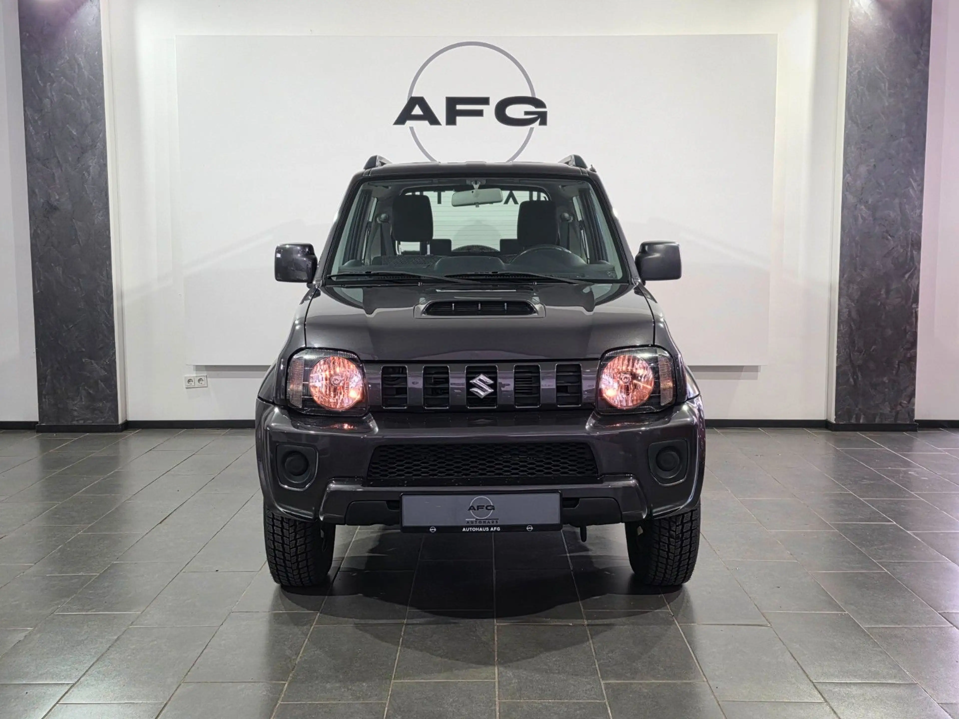 Suzuki Jimny Comfort Lim.*4X4*AHK*SHZ* — photo 2