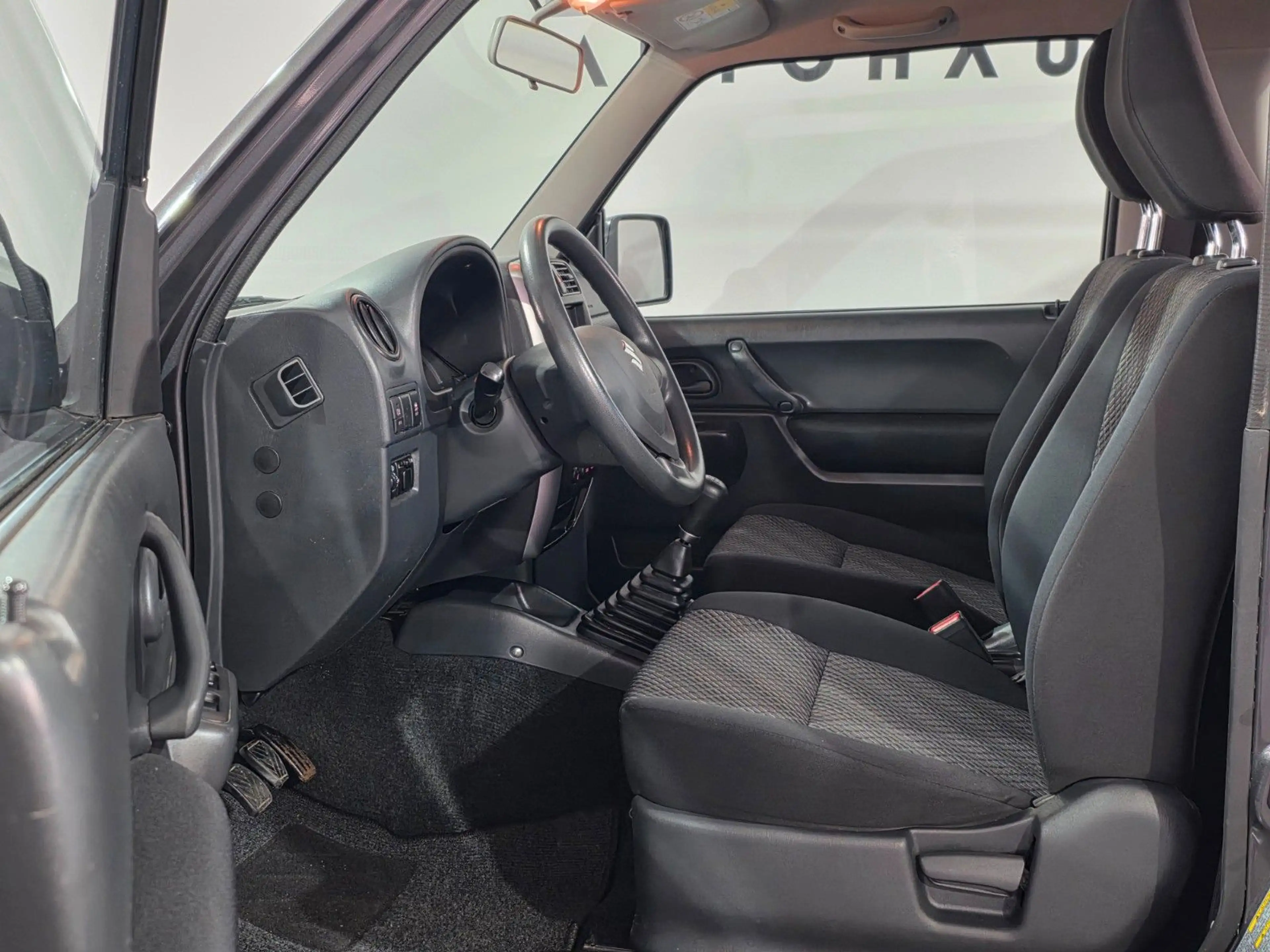 Suzuki Jimny Comfort Lim.*4X4*AHK*SHZ* — photo 14