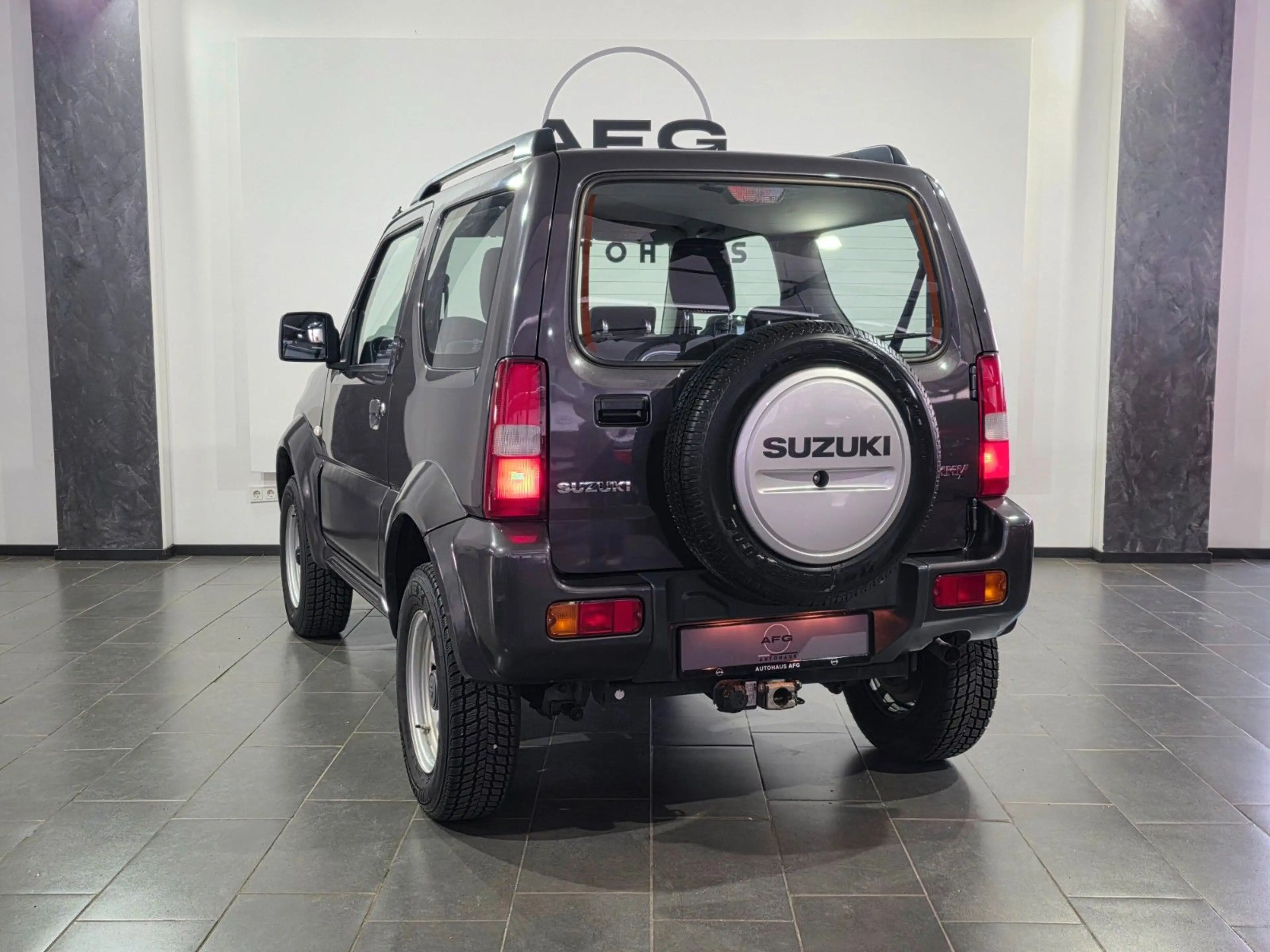 Suzuki Jimny Comfort Lim.*4X4*AHK*SHZ* — photo 7