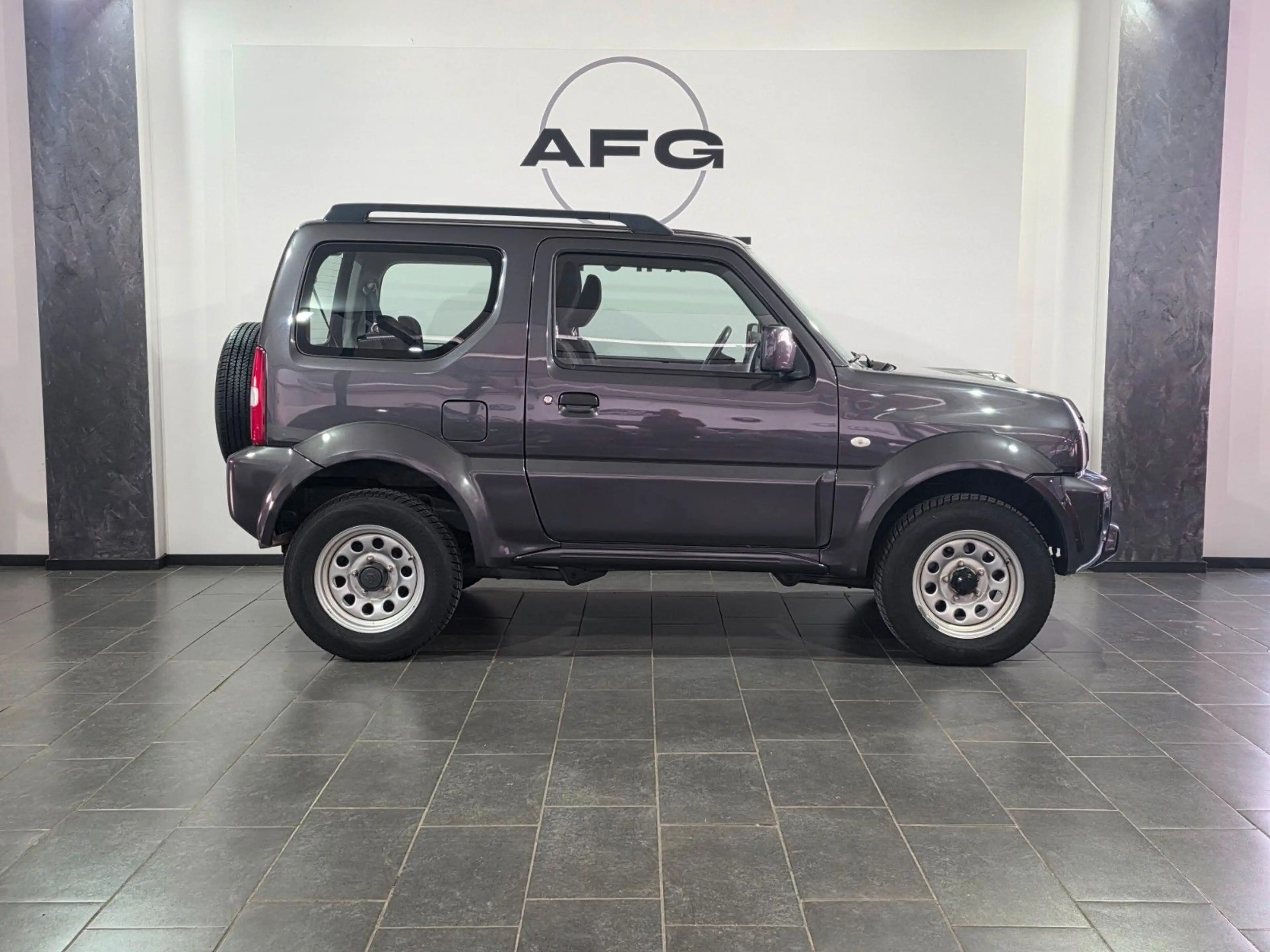Suzuki Jimny Comfort Lim.*4X4*AHK*SHZ* — photo 4