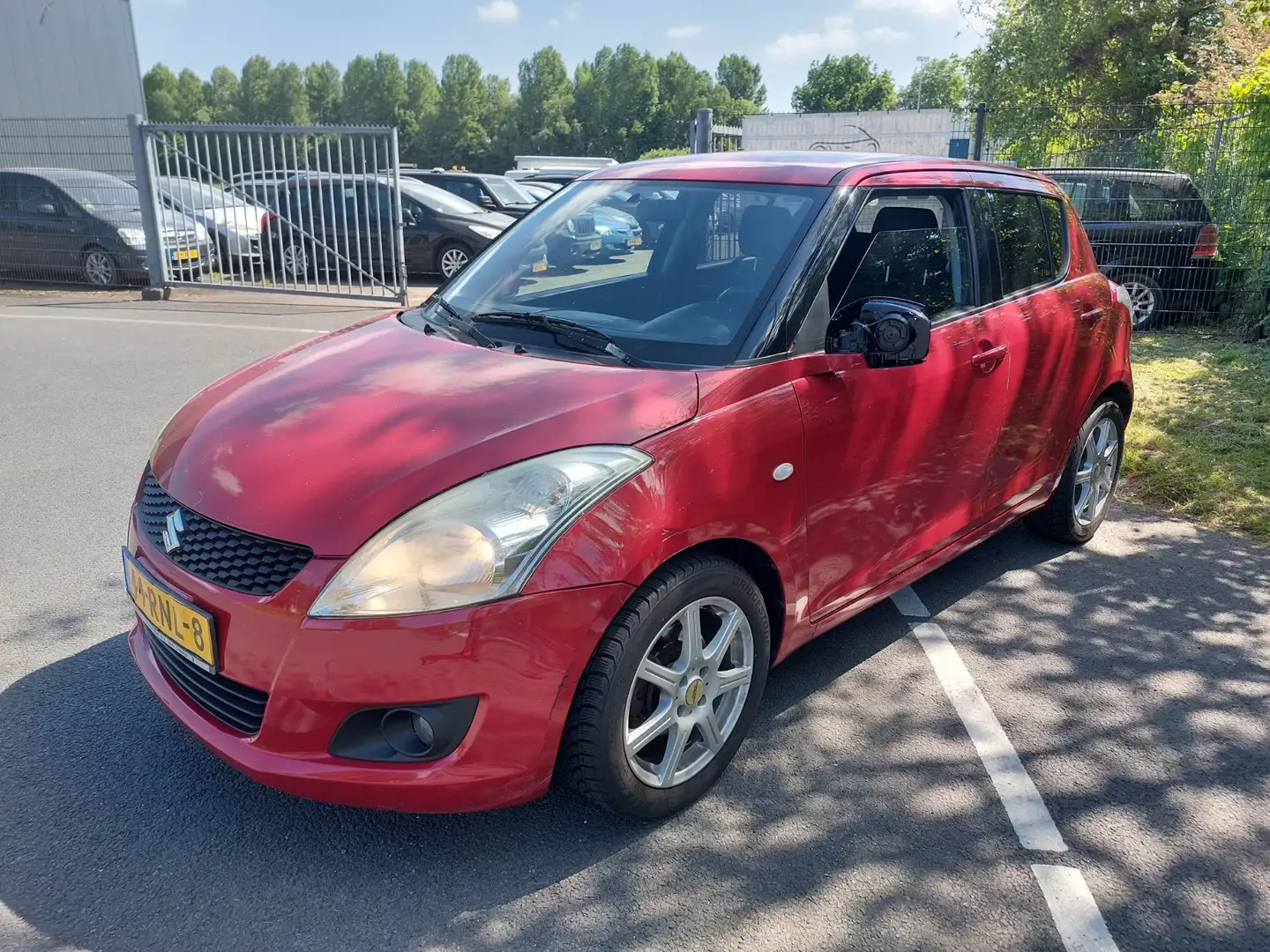 Suzuki Swift 1.2 Exclusive 5 Deurs AIRCO Lichte schade Rood - 1