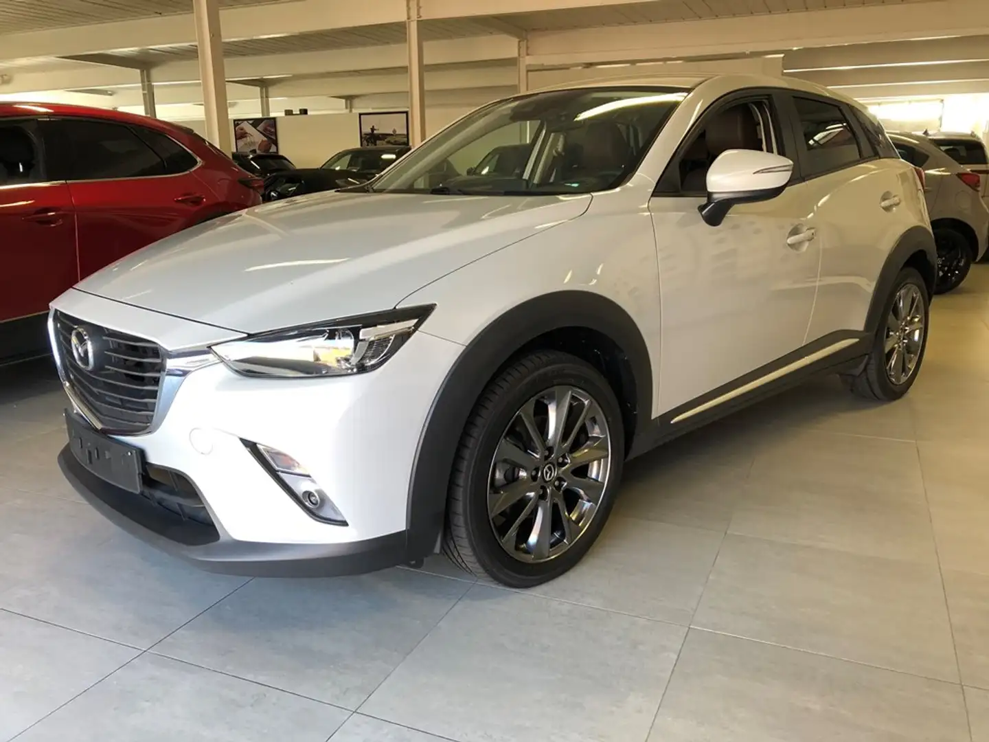 Mazda CX-3 AIRCO+AUTOMAAT+GPS+CAMERA+PARKEERSENSOREN+1J GARAN Wit - 1