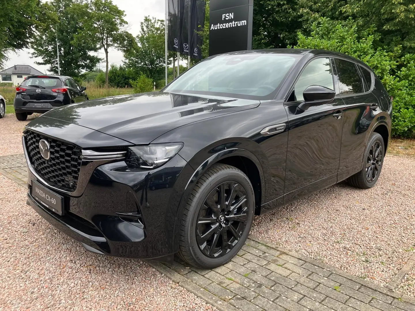 Mazda CX-60 2025 2.5L PHEV 327PS AWD Homura Plus Schwarz - 1