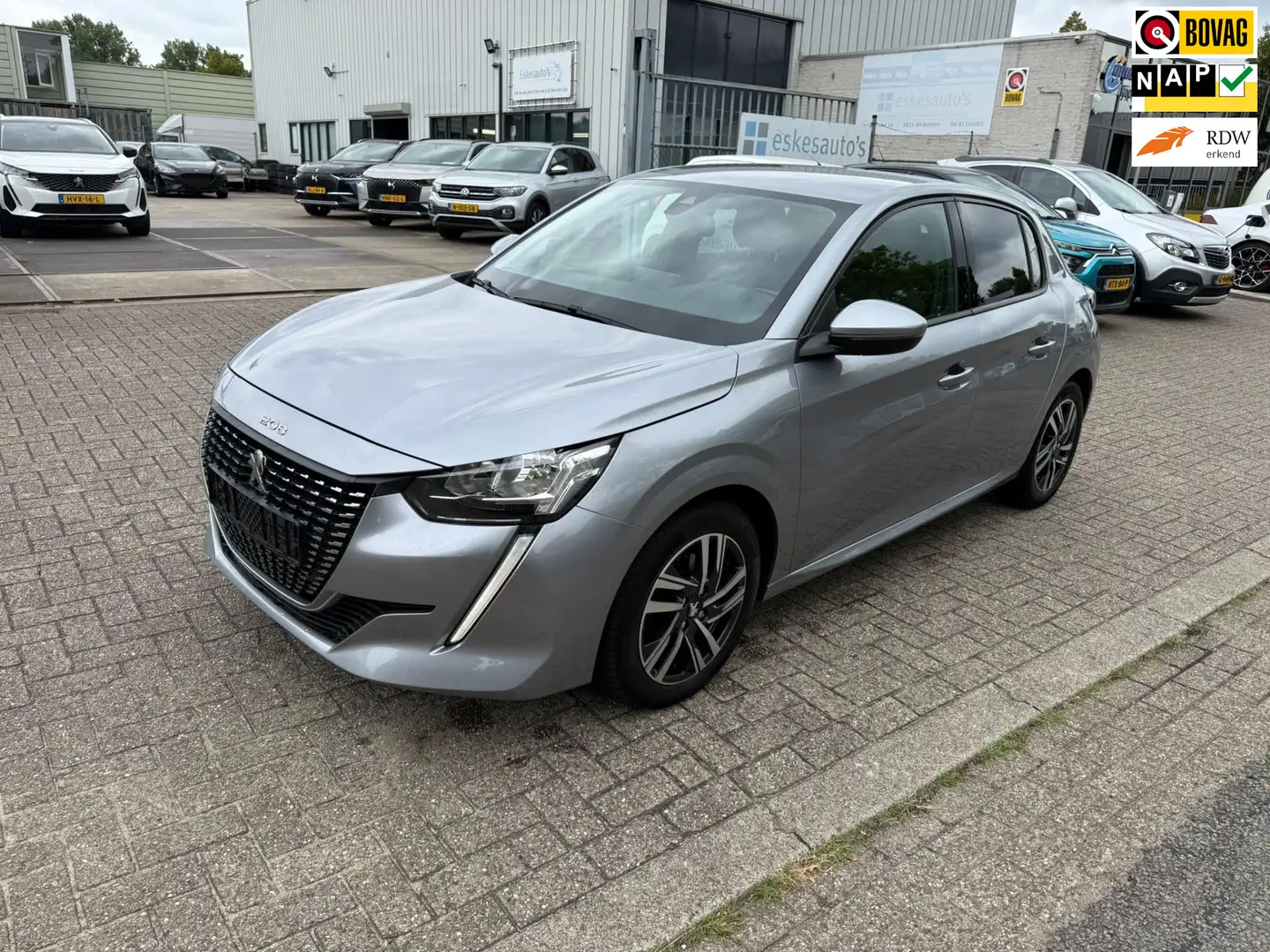 Peugeot 208 1.2 PureTech Allure 100PK, Navi, 12 mnd garantie Grigio - 1