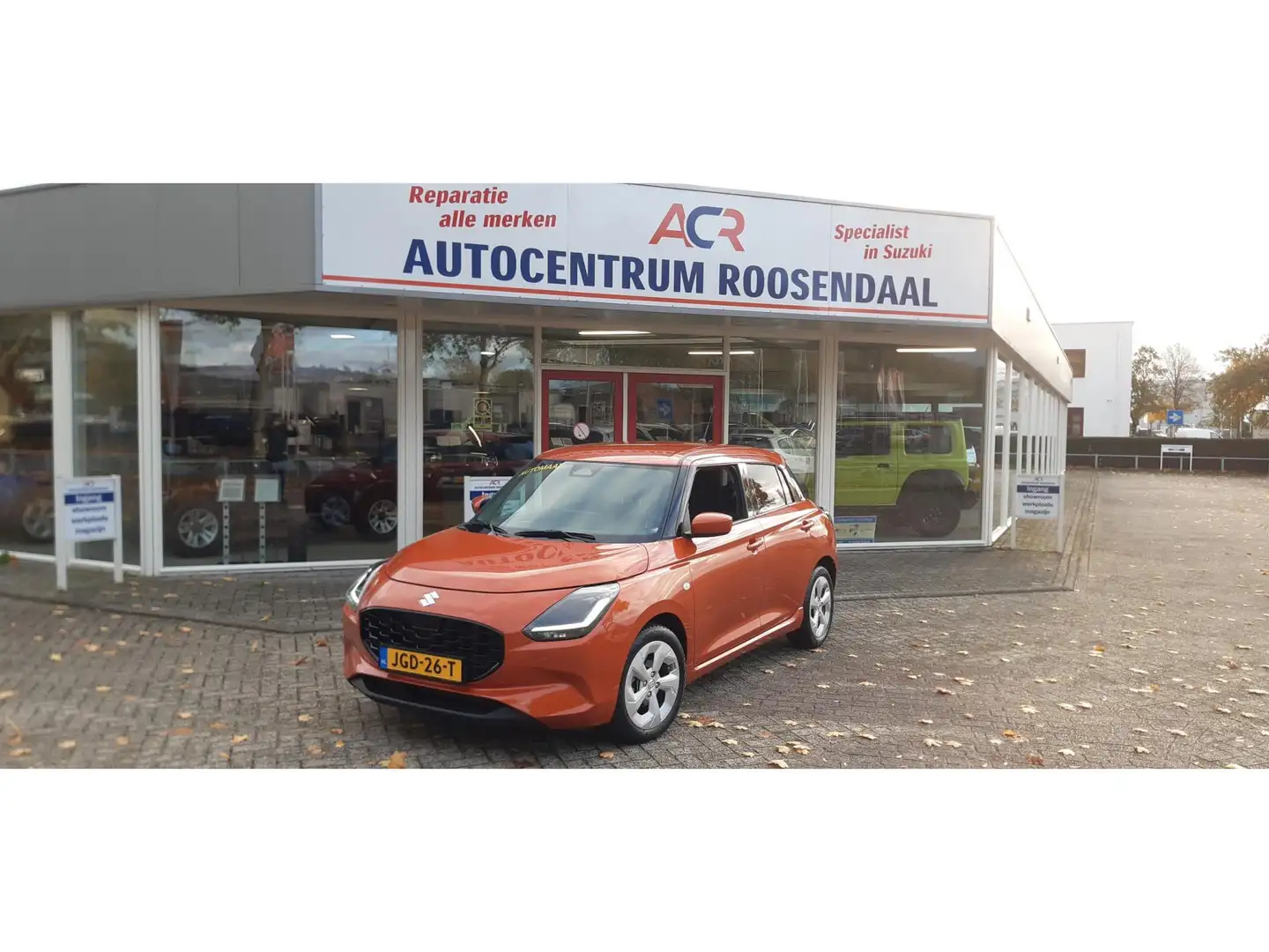 Suzuki Swift 1.2 Select Smart Hybrid AUTOMAAT Orange - 1