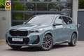 BMW X1 18i M Sport | LED | Carplay | Fabrieksgarantie Groen - thumbnail 1