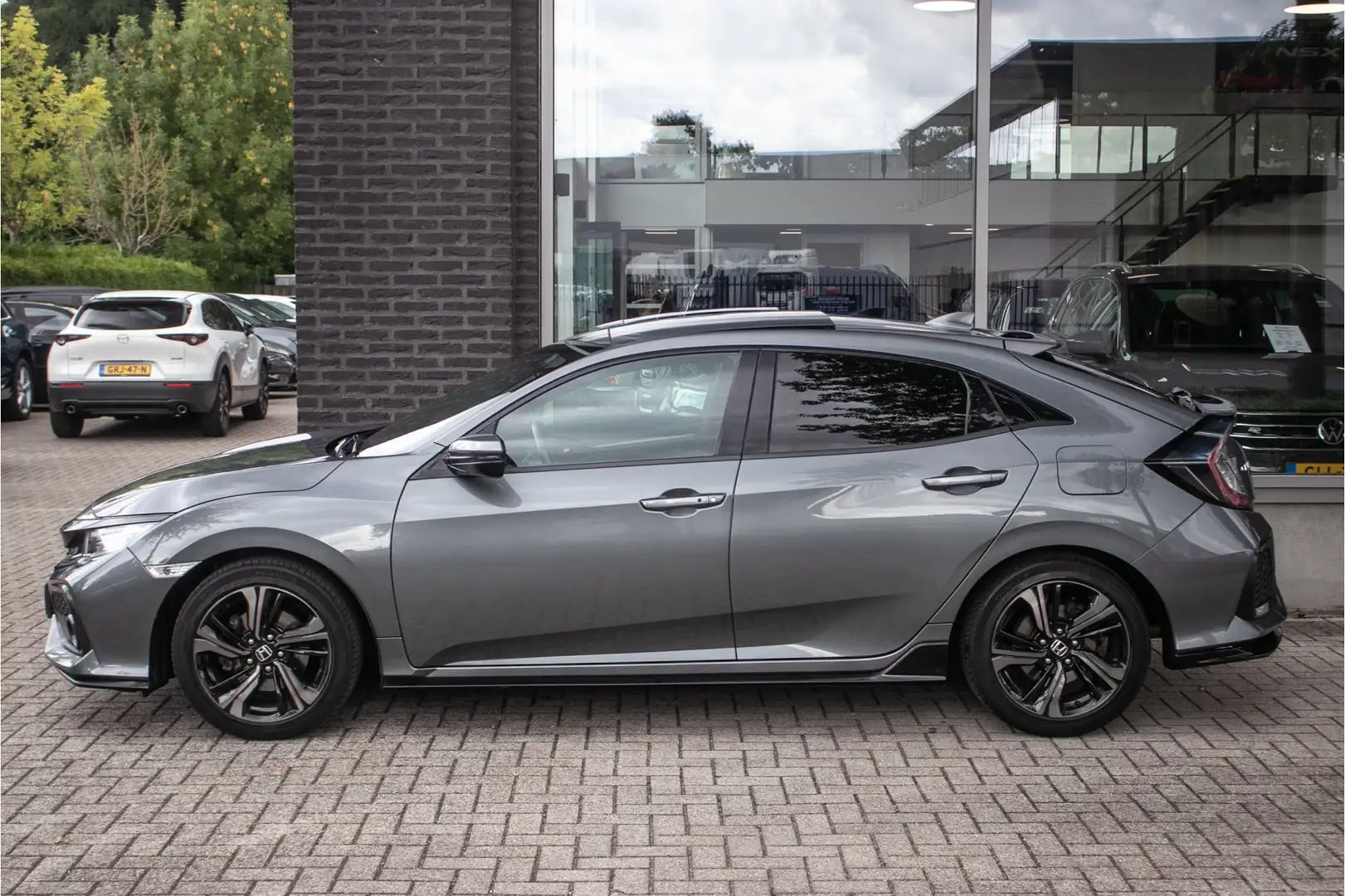 Honda Civic 1.5 i-VTEC Sport Plus All-in rijklaarprijs | Schui Grijs - 2