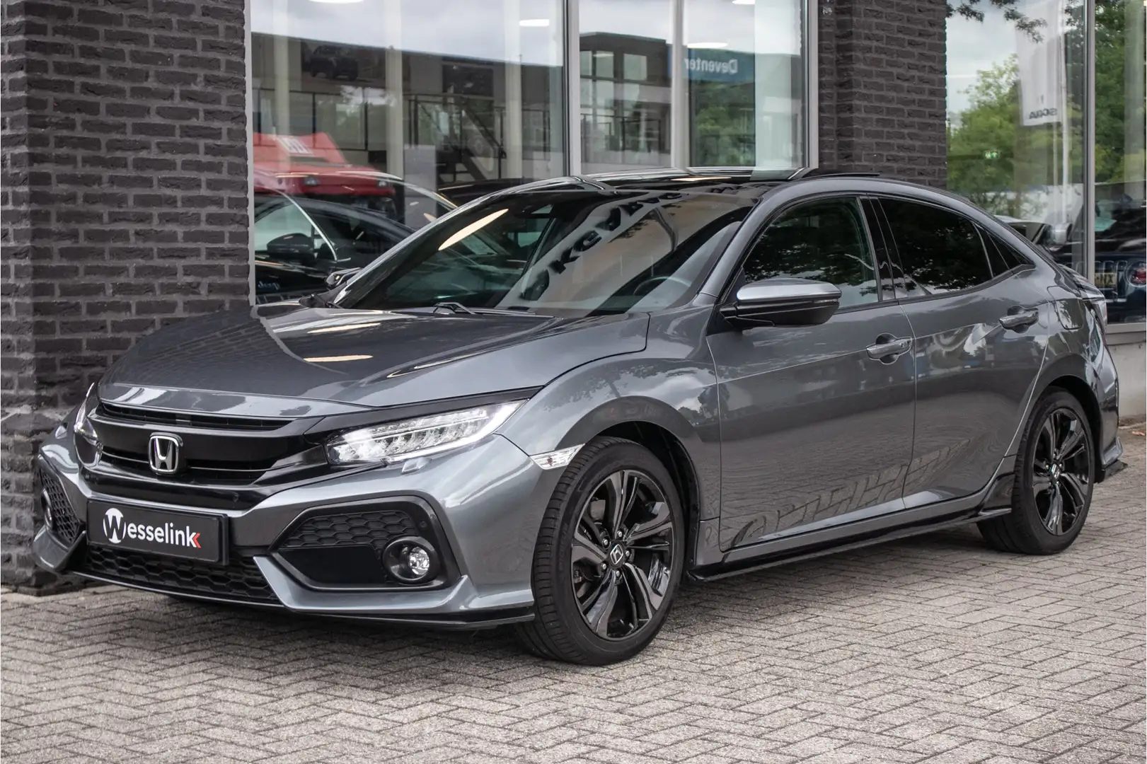 Honda Civic 1.5 i-VTEC Sport Plus All-in rijklaarprijs | Schui Grijs - 1