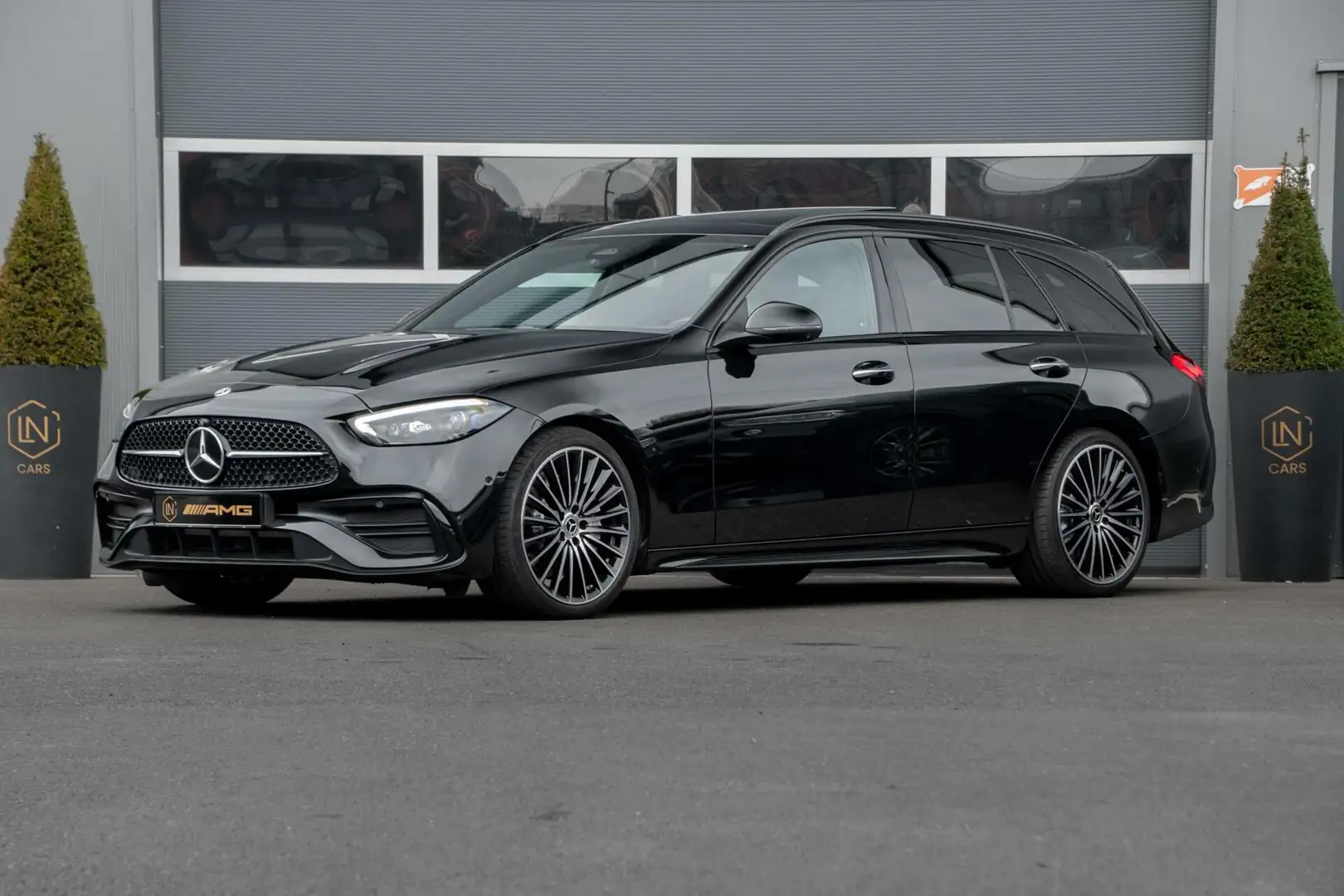Mercedes-Benz C 200 Estate AMG | HUD | PANO | Trekhaak Zwart - 1