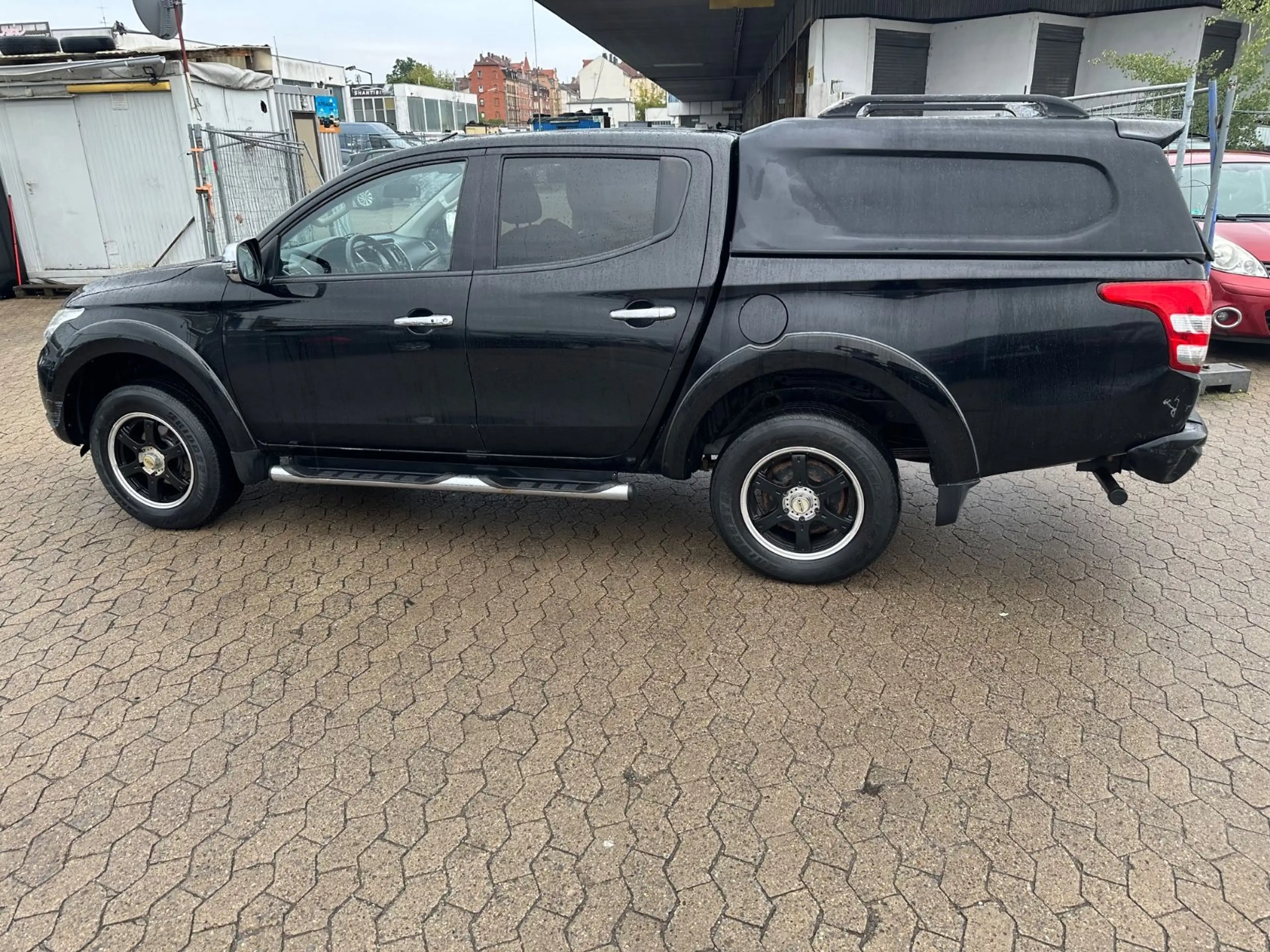 Mitsubishi L200 — photo 15