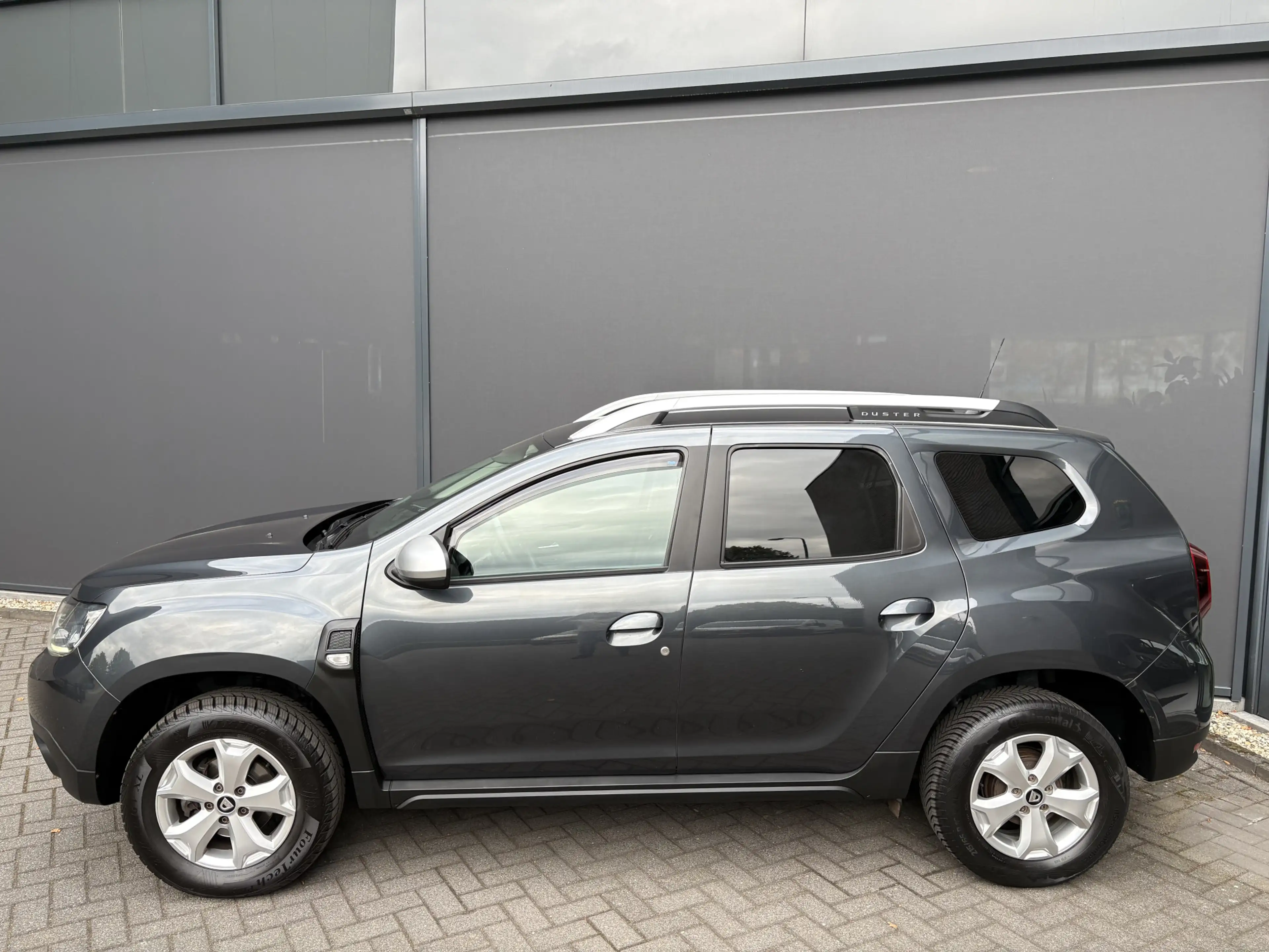 Dacia Duster 1.2 TCe Comfort Achteruitrijcamera - Airco - Navig — photo 7