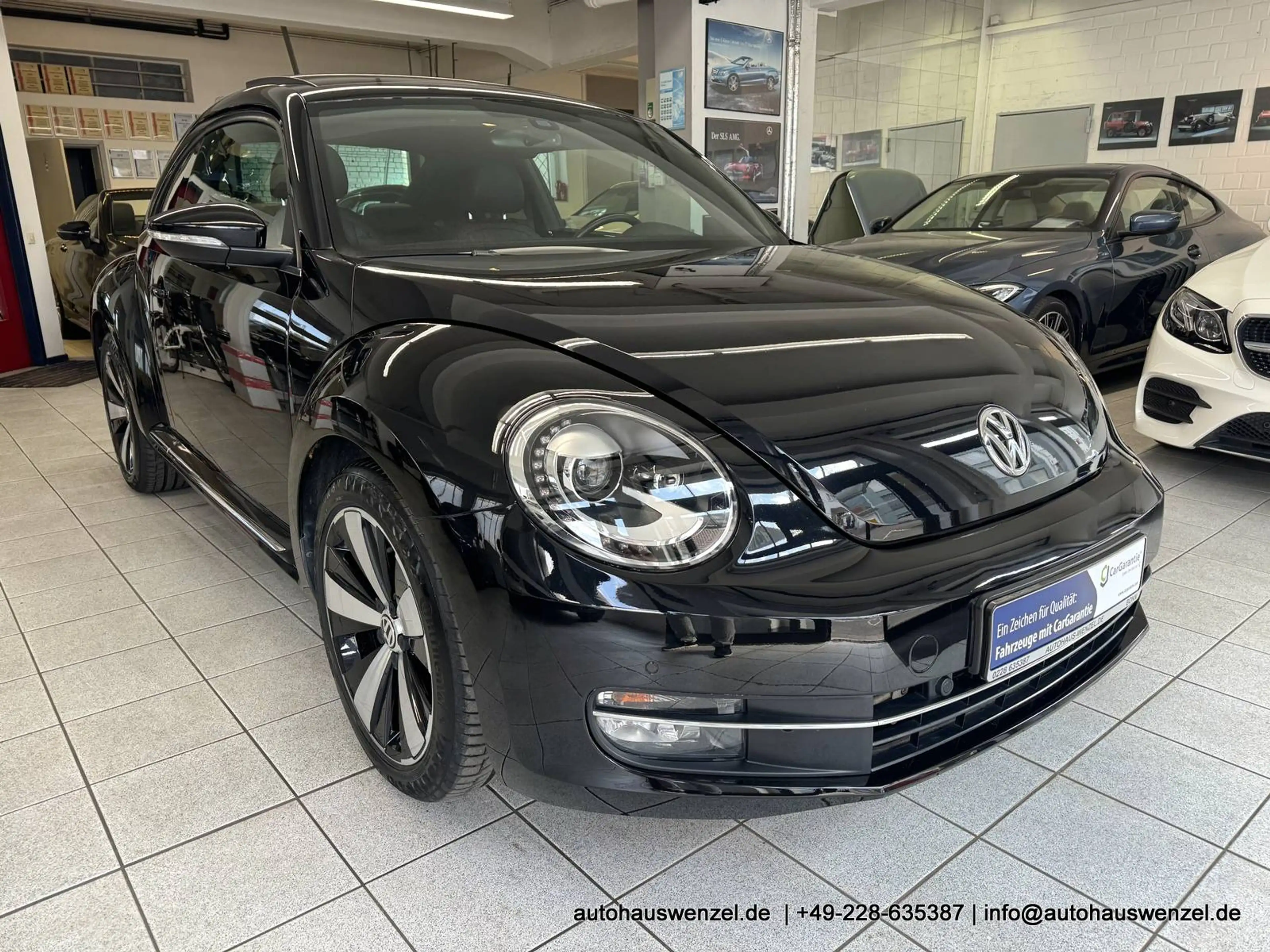 Volkswagen Beetle 1.4 6-Gang Sport PANORAMADACH LEDER XENON FENDER CARPLAY ... — photo 4