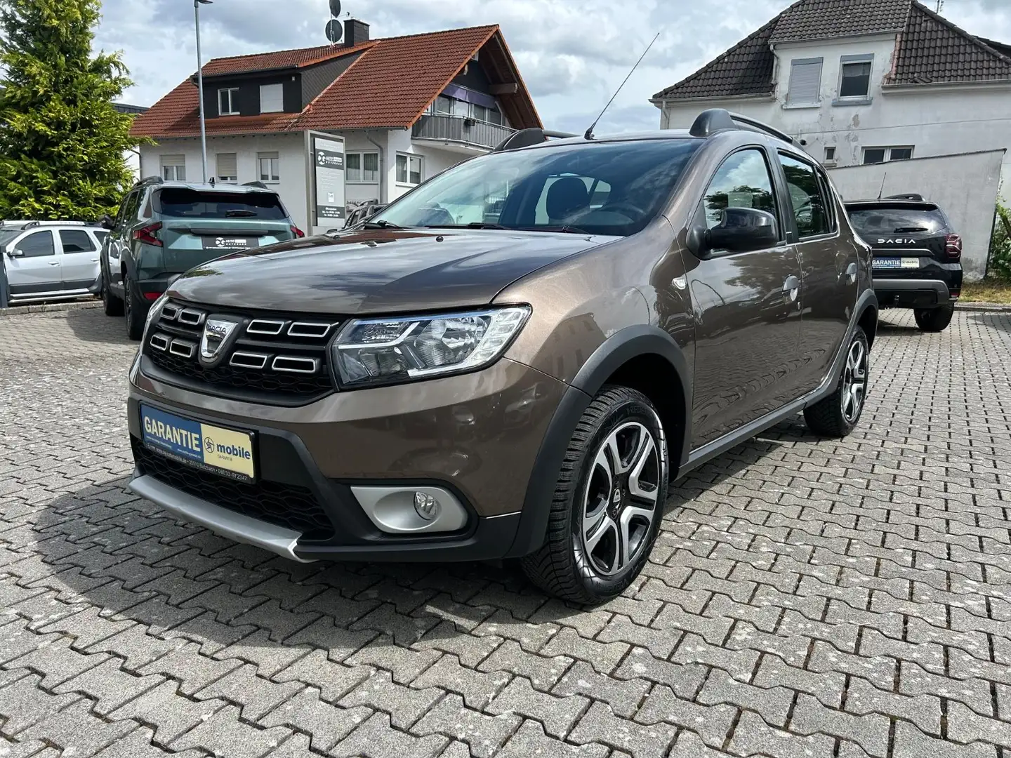 Dacia Sandero TCe 90 LPG Stepway Celebration Braun - 1