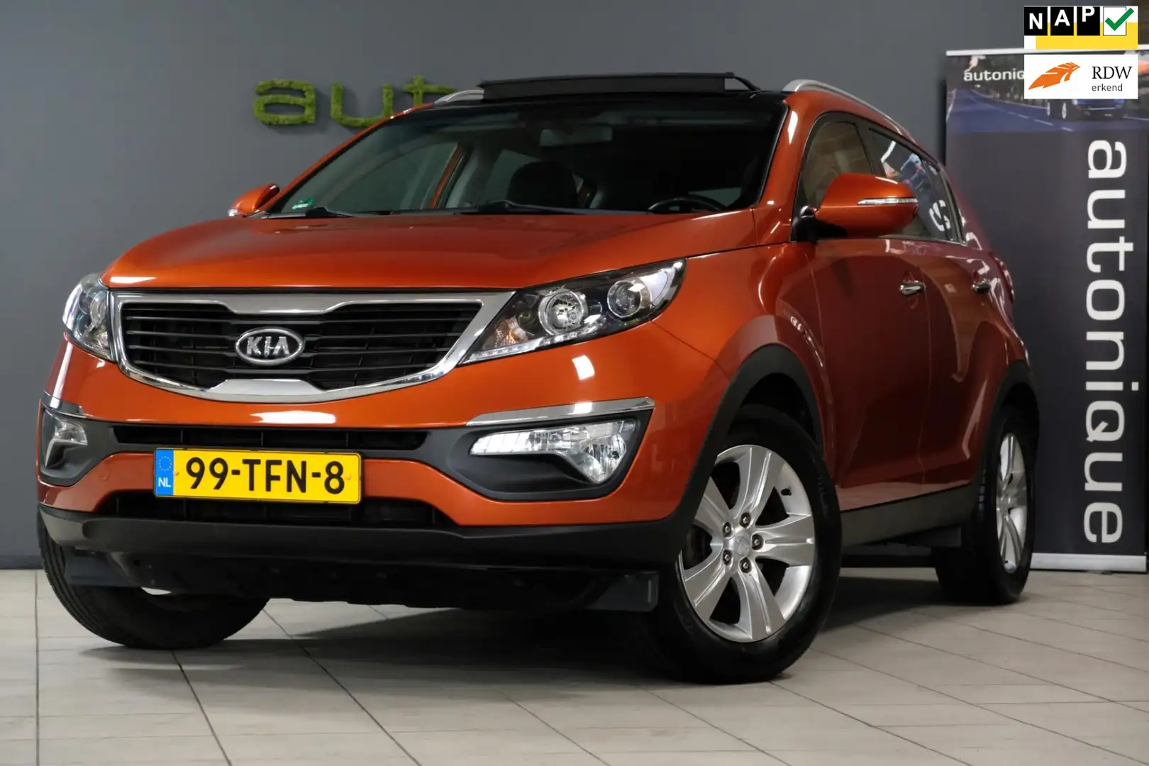 Kia Sportage 1.6 GDI X-ecutive *Panoramadak* Cruise/NAP/Bluetoo Oranj - 1