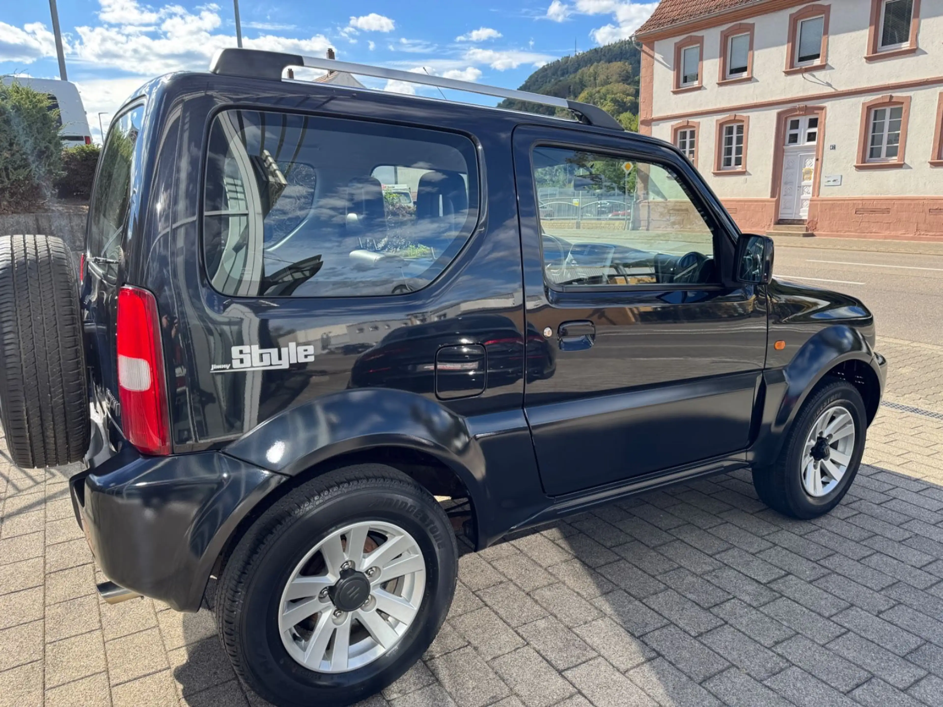 Suzuki Jimny 1.3 4WD Ranger+AHK+Leder+SitzHz+Klima — photo 9