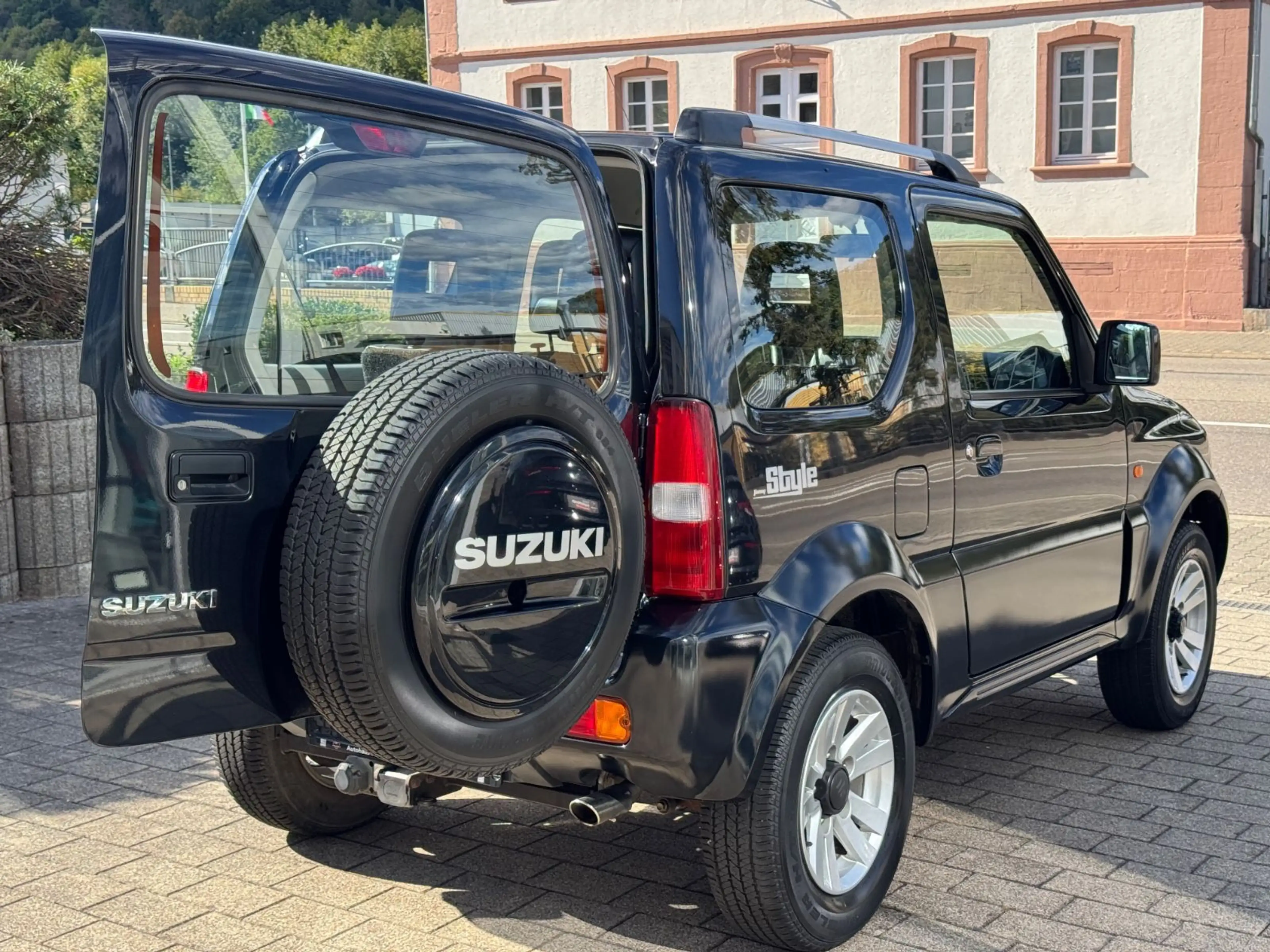 Suzuki Jimny 1.3 4WD Ranger+AHK+Leder+SitzHz+Klima — photo 11