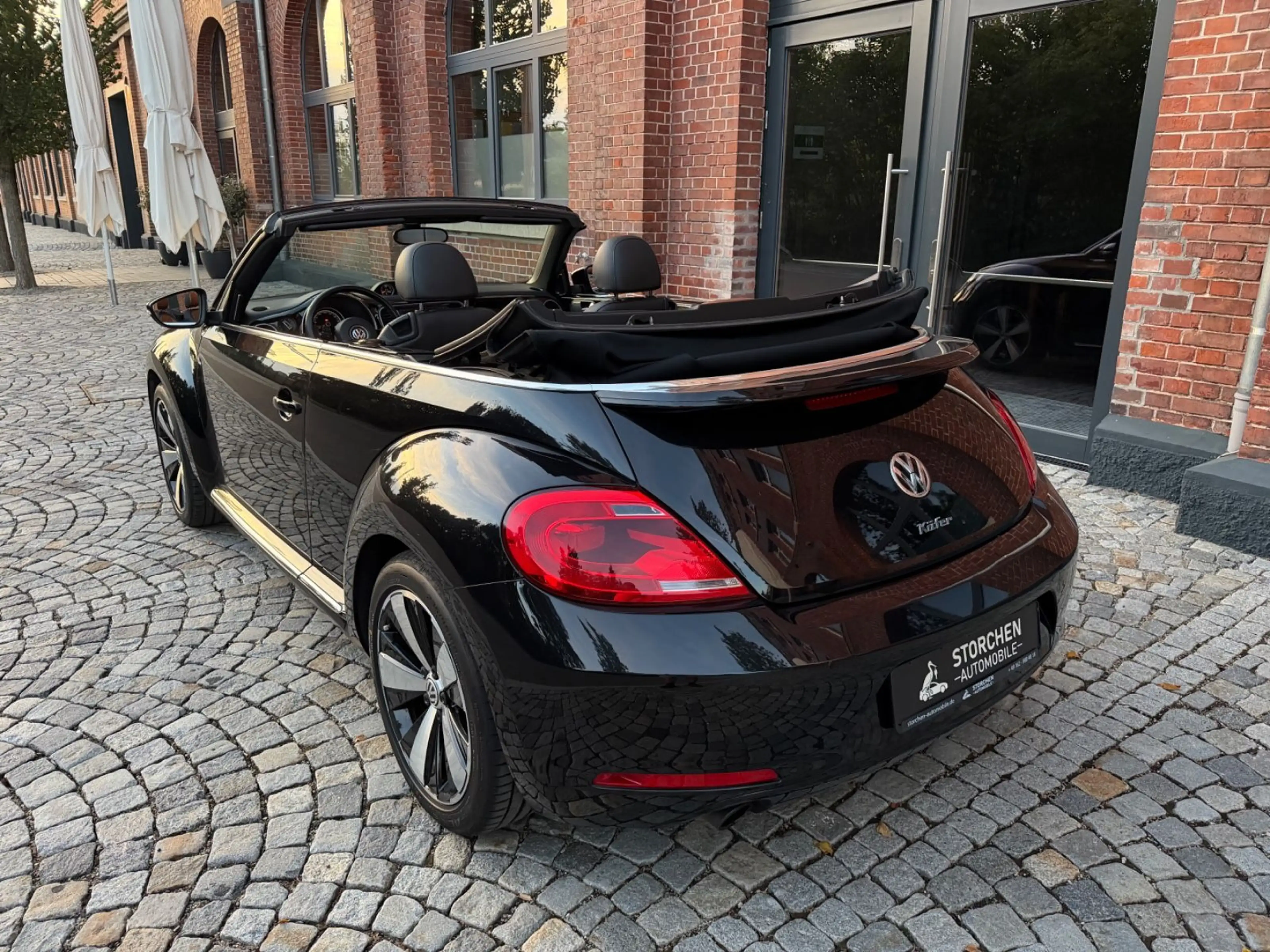 Volkswagen Beetle Cabrio Exclusive Sport *1.Hand*Navi*Leder — photo 6
