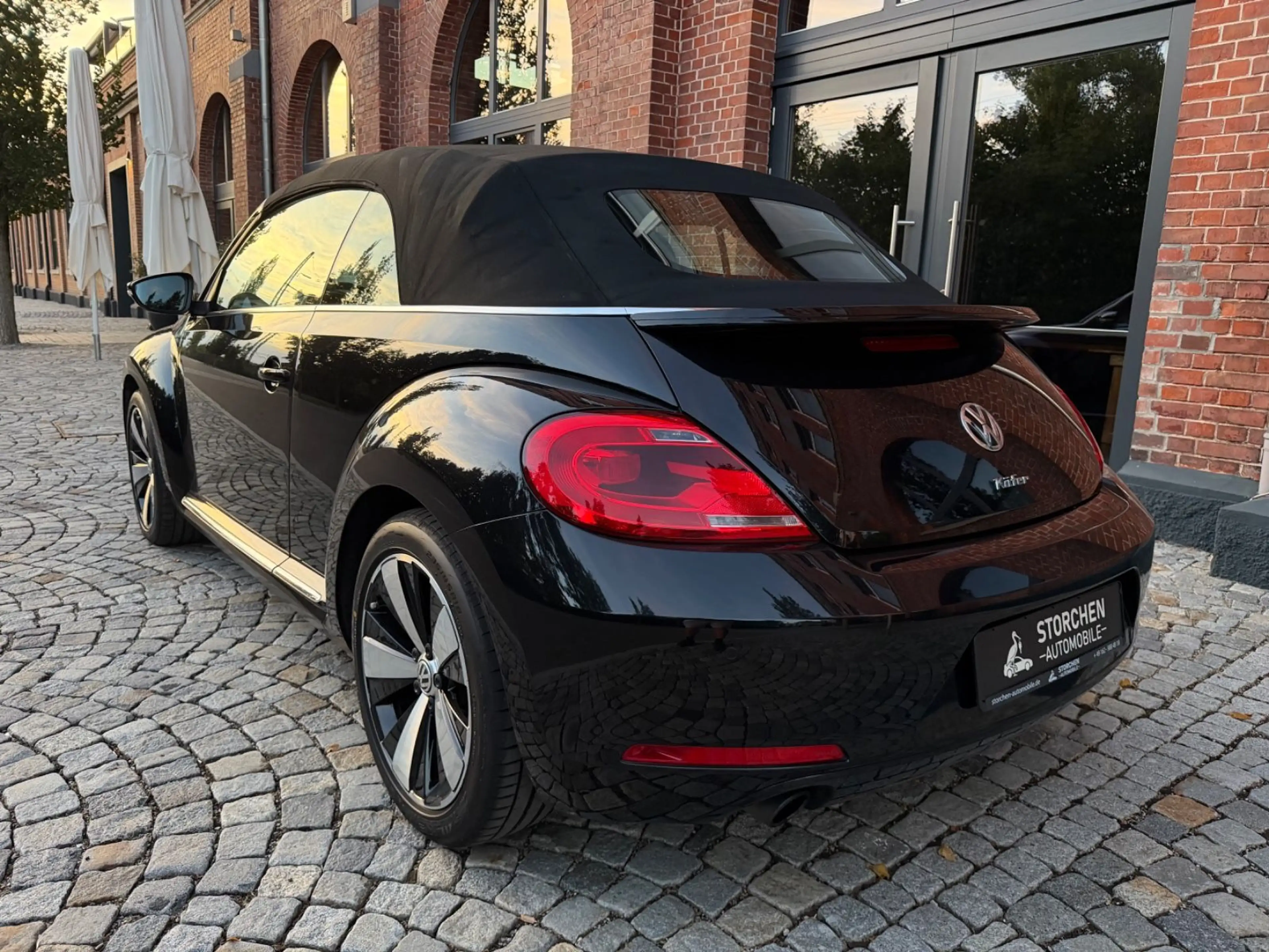 Volkswagen Beetle Cabrio Exclusive Sport *1.Hand*Navi*Leder — photo 5