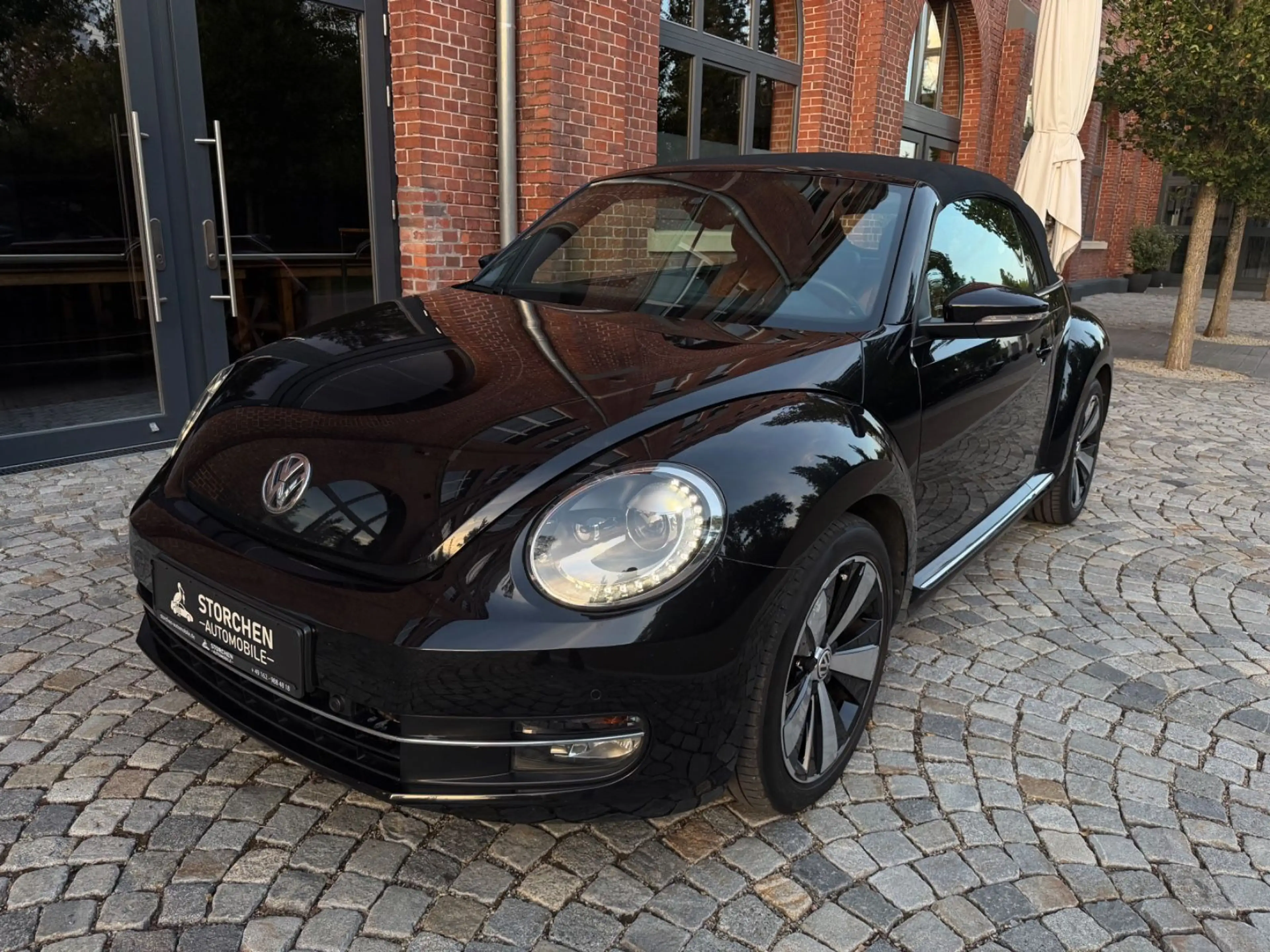 Volkswagen Beetle Cabrio Exclusive Sport *1.Hand*Navi*Leder — photo 9