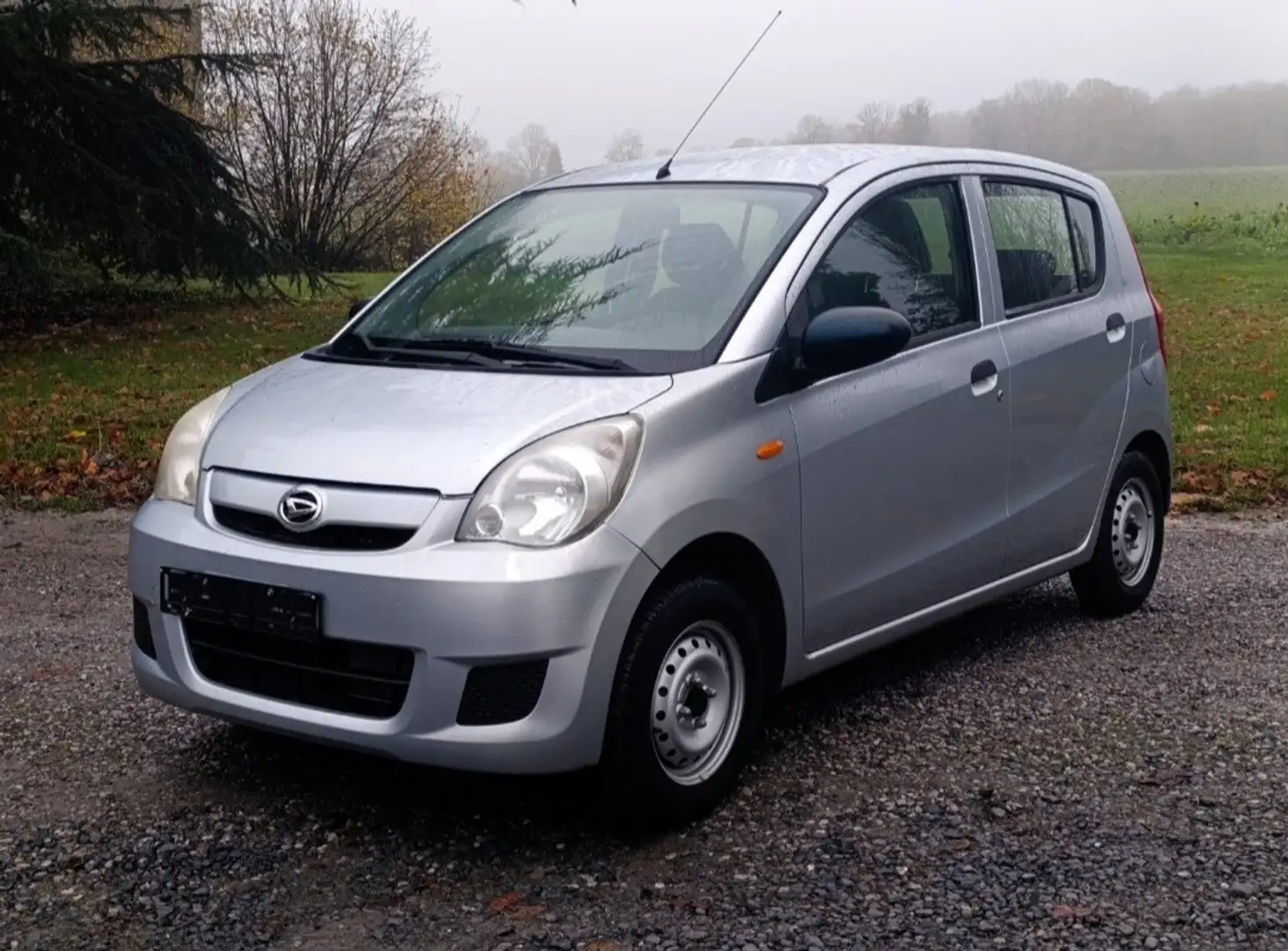 Daihatsu Cuore 1.0i Top - 1