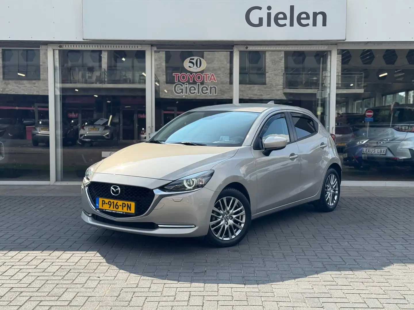 Mazda 2 1.5 SKYACTIV-G Luxury | Dodehoekherkenning, Head u Brun - 1