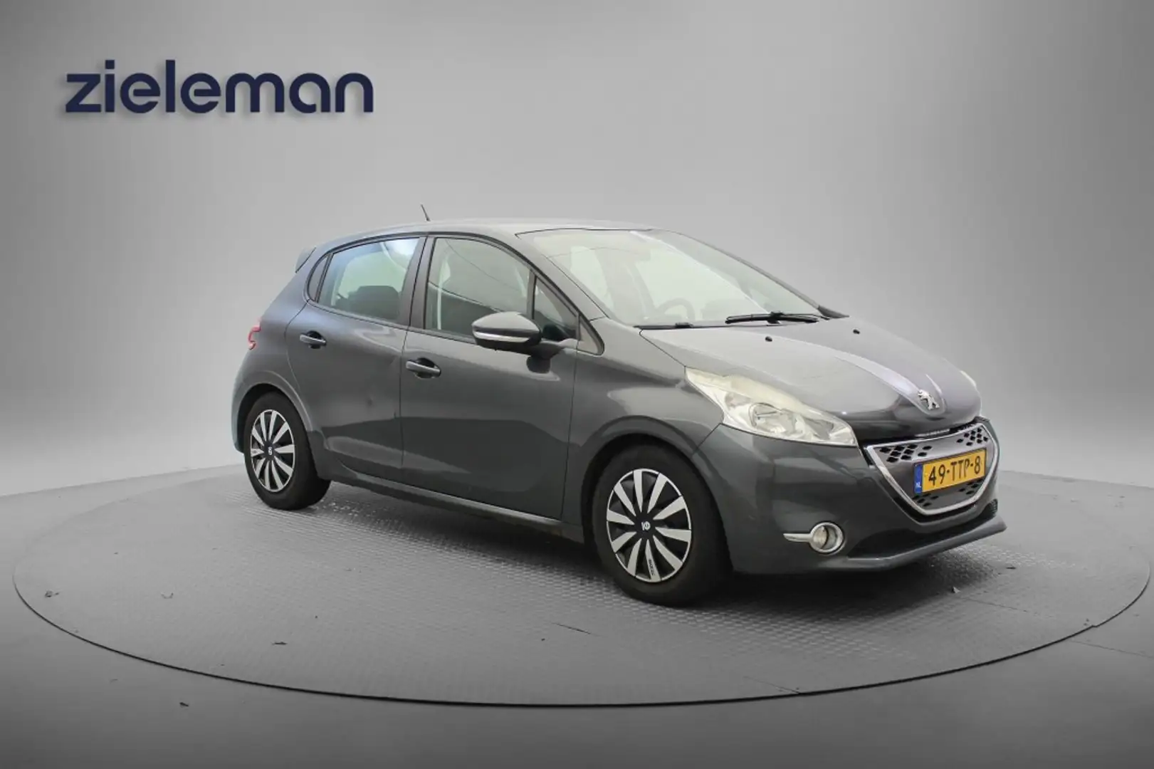 Peugeot 208 1.4 e-HDI Blue Automaat - Navi, Cruise Grau - 1