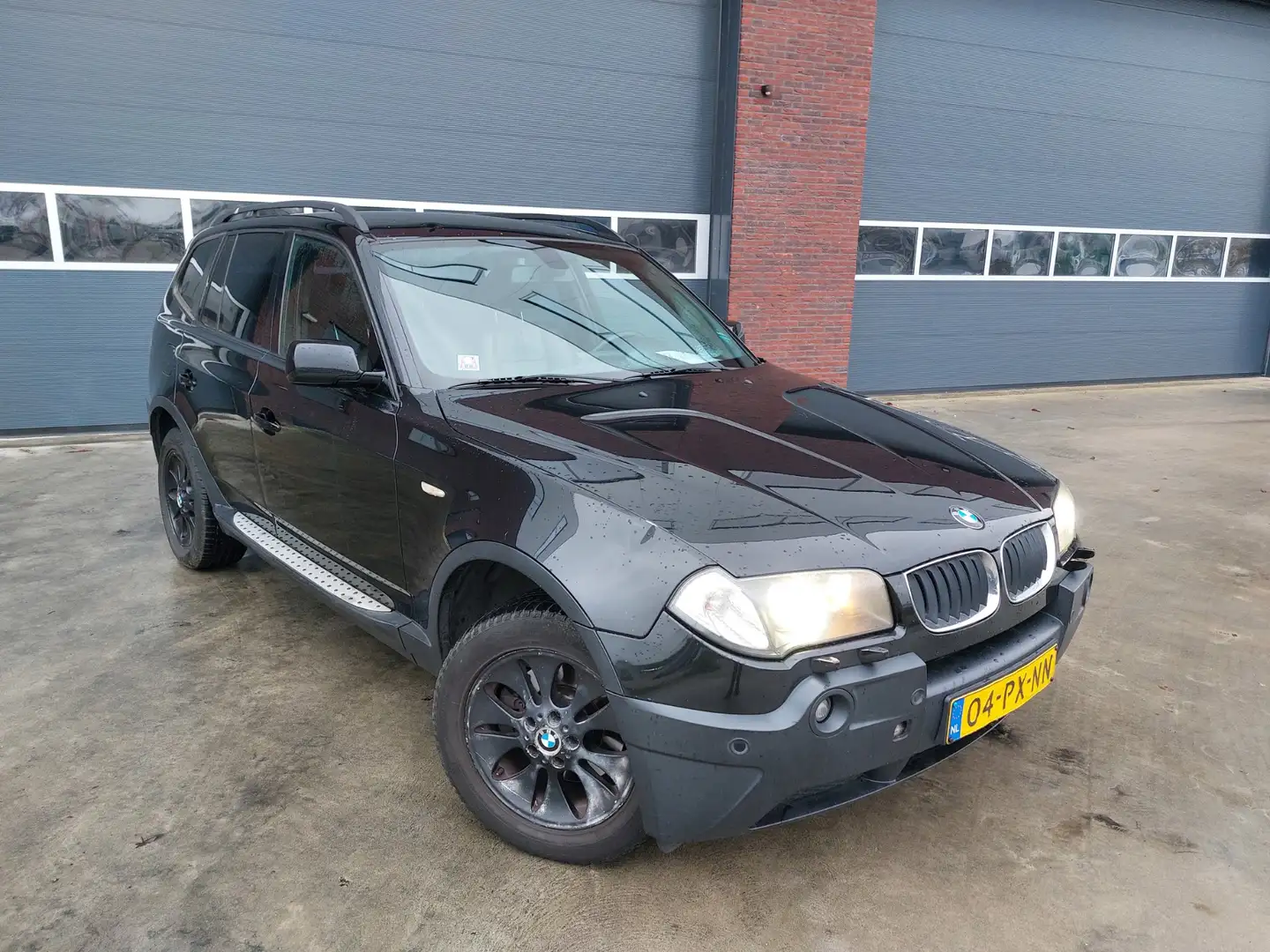 BMW X3 2.0d High Executive 4WD Airco/ECC/Navigatie/Leer U Zwart - 1