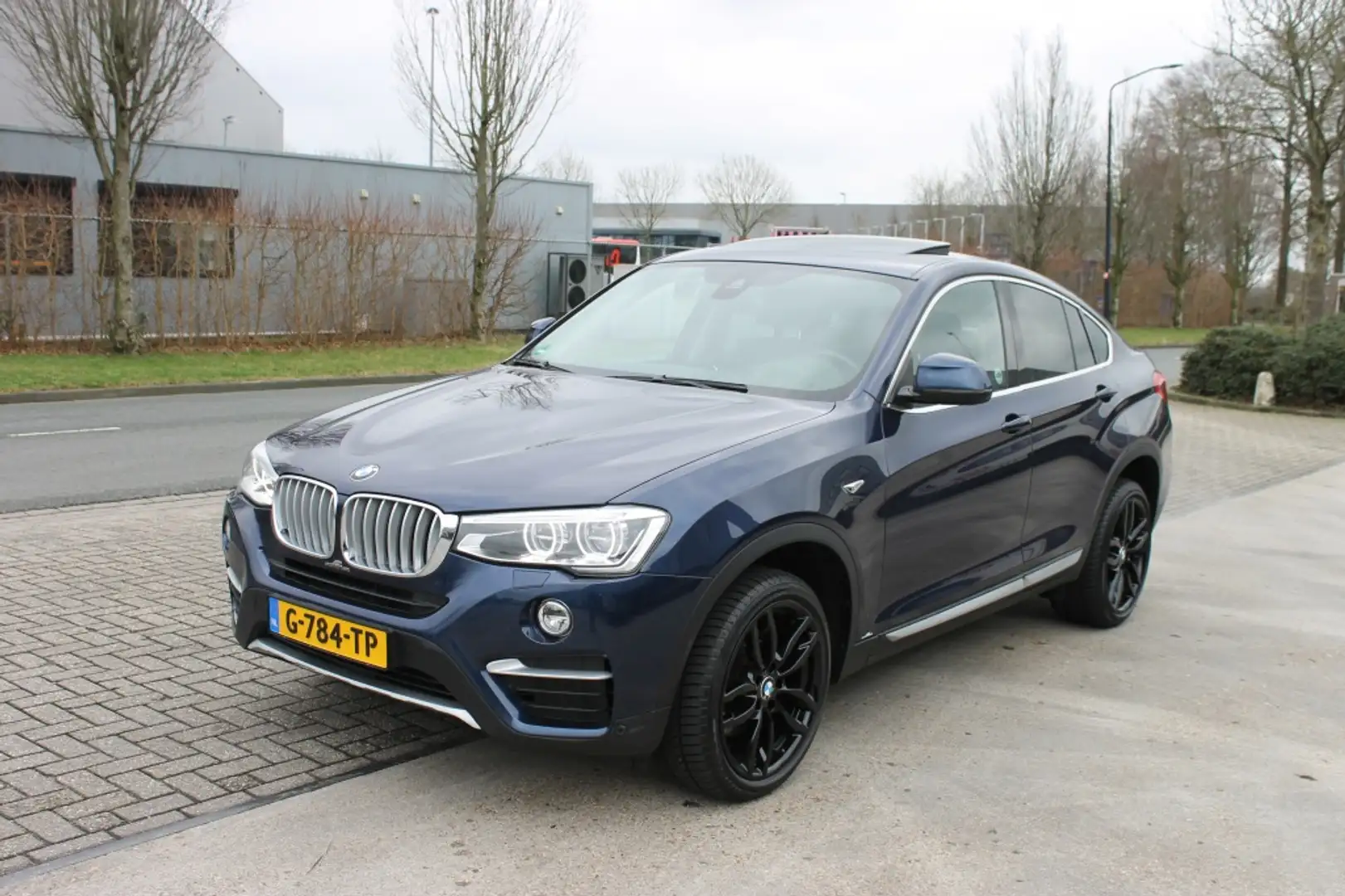 BMW X4 xDrive35d High Exec HUD 380pk! Blauw - 1