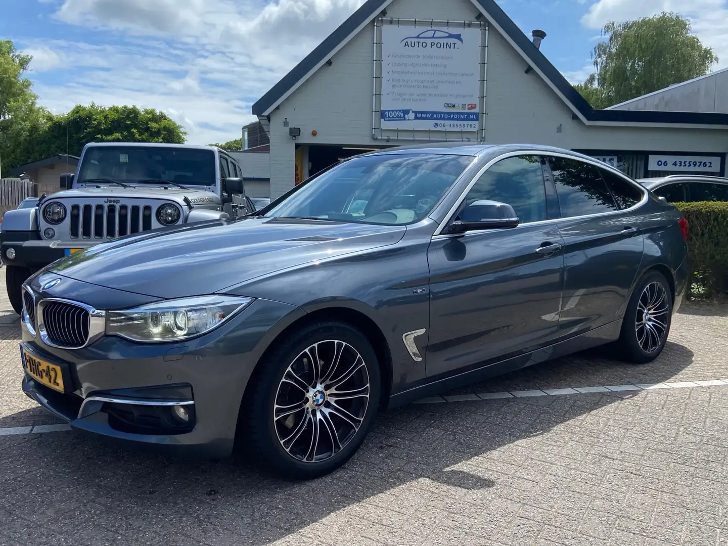BMW 320 3-serie Gran Turismo 320D HIGH EXECUTIVE AUT/NAVI/ Grijs - 1