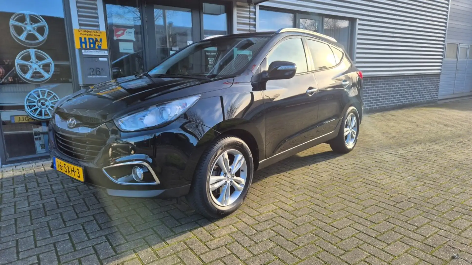 Hyundai iX35 2.0i Style AIRCO ACC TREKHAAK CRUISE CAMERA AUTOMA Noir - 1
