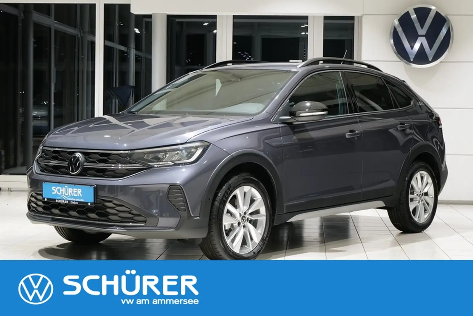 Volkswagen Taigo 1.0TSI DSG Goal RKam Navi Totwinkel ACC Led Grau - 1