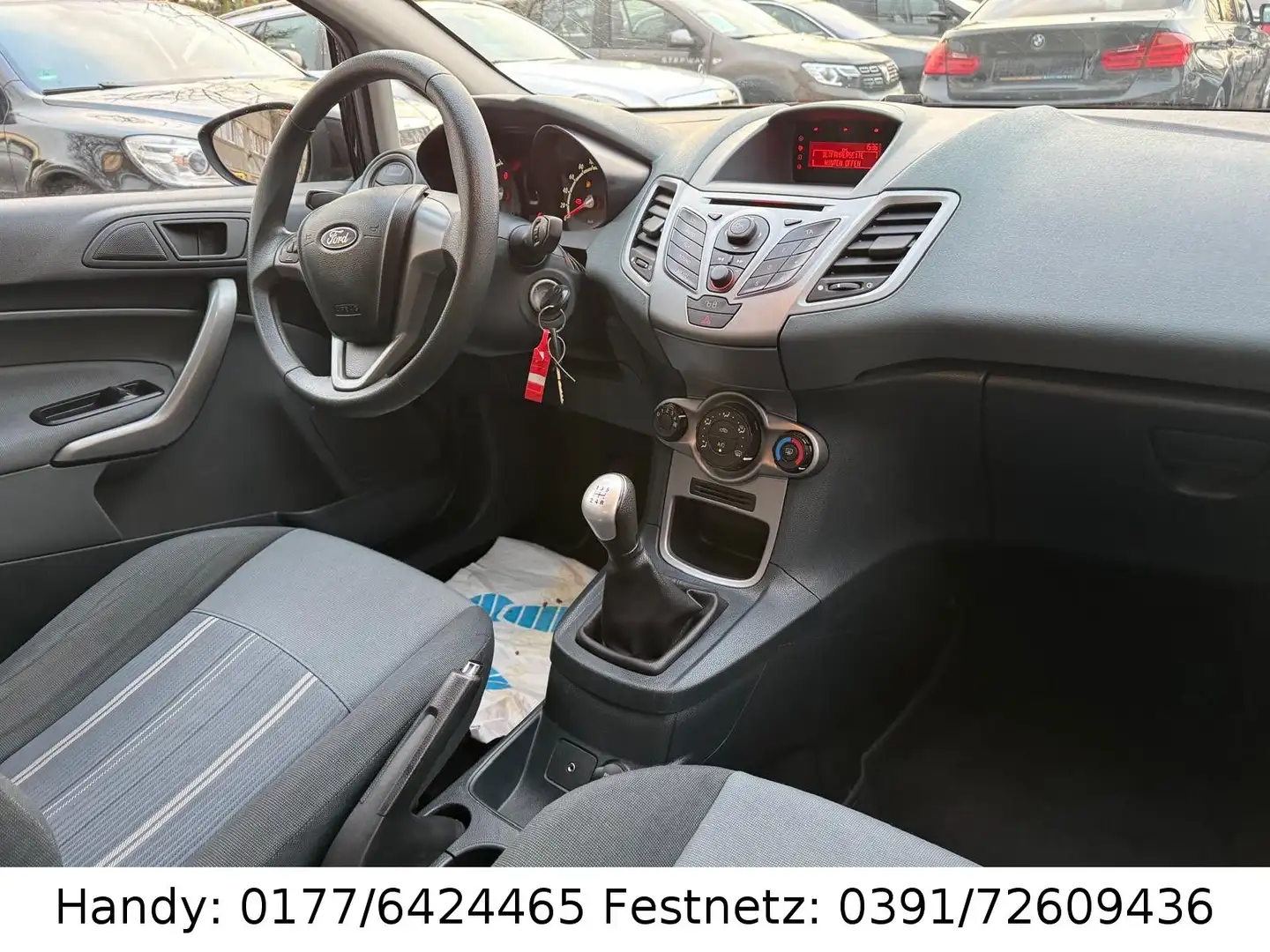 Ford Fiesta 1,25 KLIMA/el.FH/ZV mit FB/8xBEREIFT Schwarz - 2